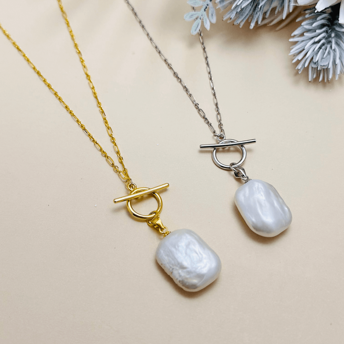 Elegant baroque freshwater pearl necklace with a toggle clasp, available in sterling silver and gold, featuring a delicate Mother & Daughter Link Chain