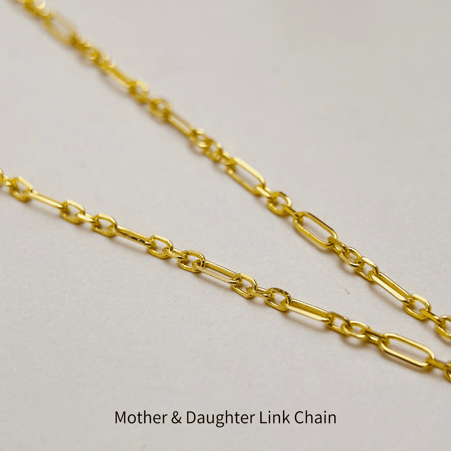 Elegant baroque freshwater pearl necklace with a toggle clasp, available in sterling silver and gold, featuring a delicate Mother & Daughter Link Chain