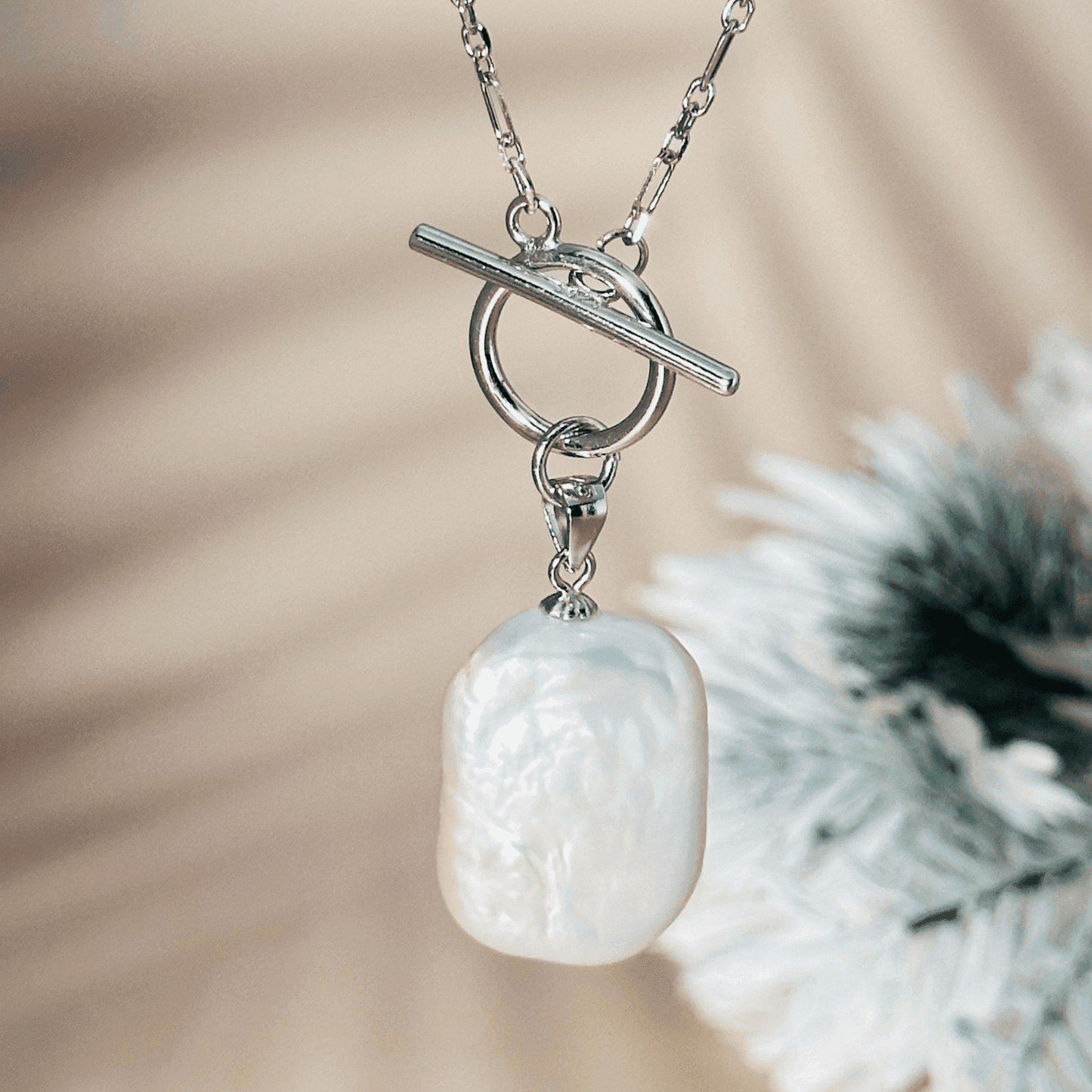 Elegant baroque freshwater pearl necklace with a toggle clasp, available in sterling silver and gold, featuring a delicate Mother & Daughter Link Chain