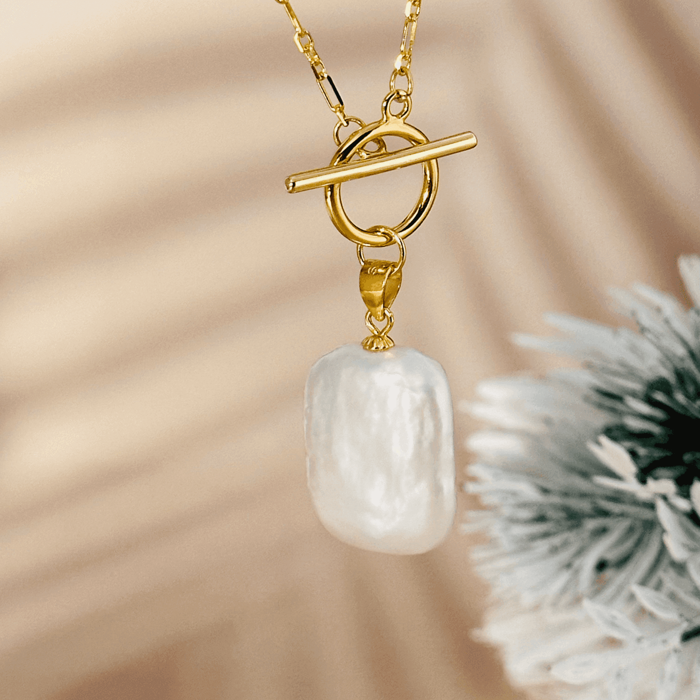 Elegant baroque freshwater pearl necklace with a toggle clasp, available in sterling silver and gold, featuring a delicate Mother & Daughter Link Chain