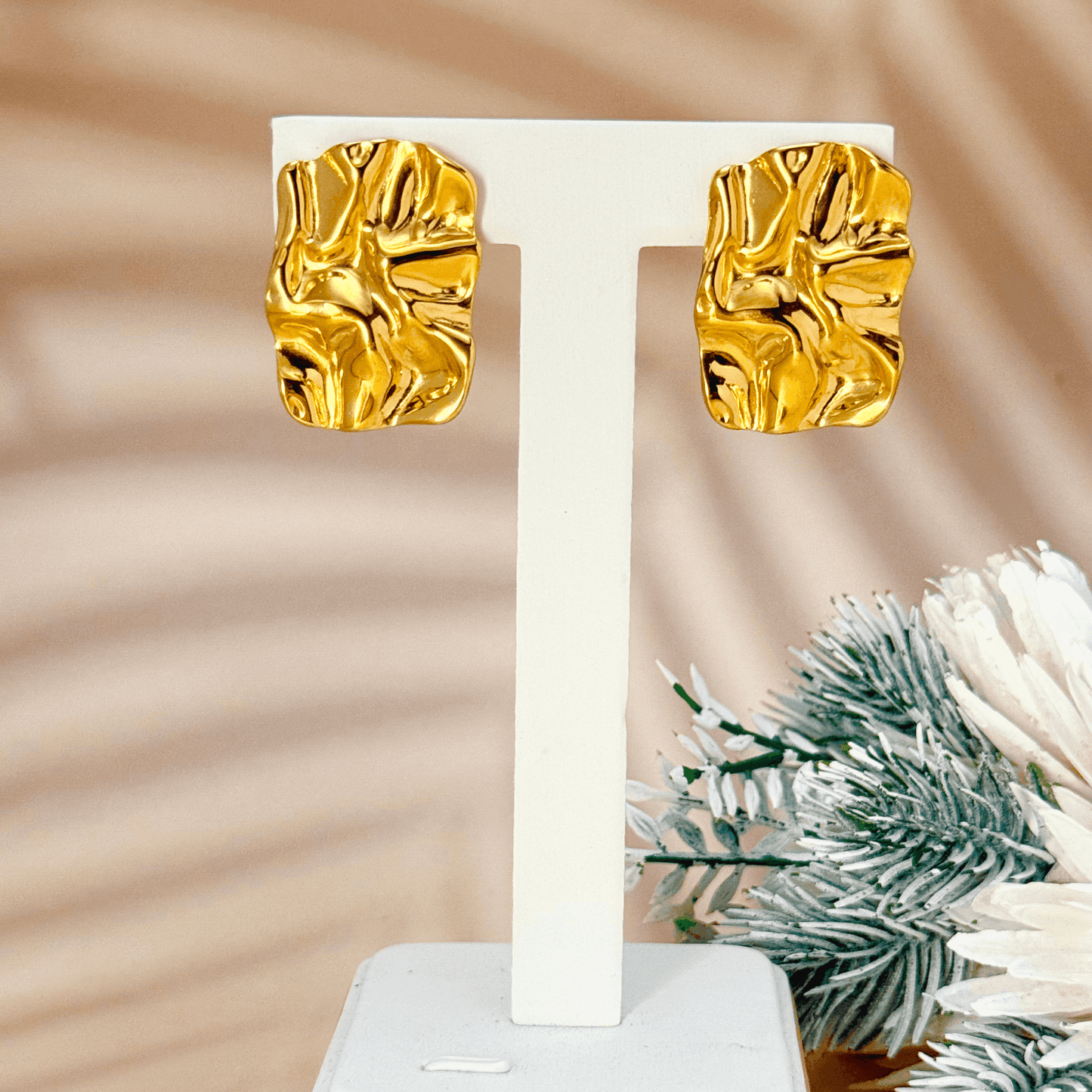 Gold and silver crinkled texture stud earrings – modern statement stainless steel earrings, PVD plated, waterproof and hypoallergenic.