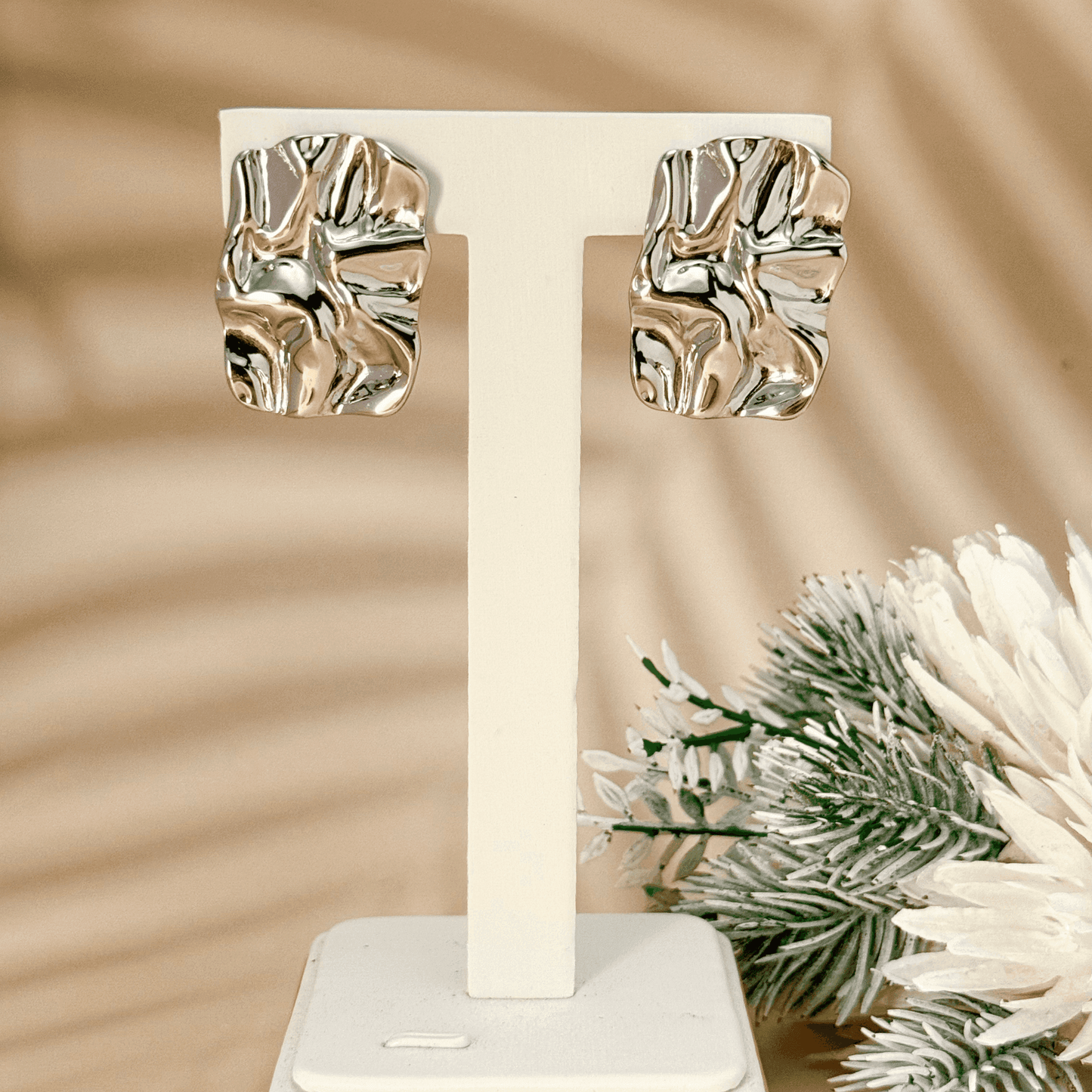 Gold and silver crinkled texture stud earrings – modern statement stainless steel earrings, PVD plated, waterproof and hypoallergenic.