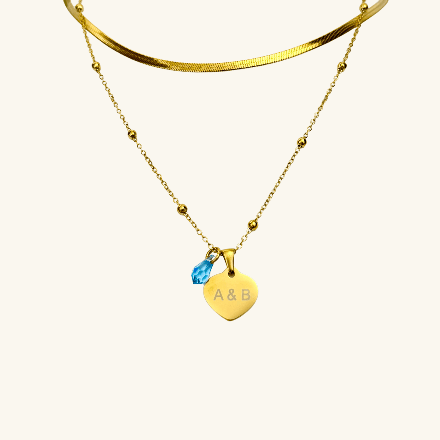 Custom engravable heart necklace with Swarovski birthstone, personalised jewellery, gold snake chain layering option.