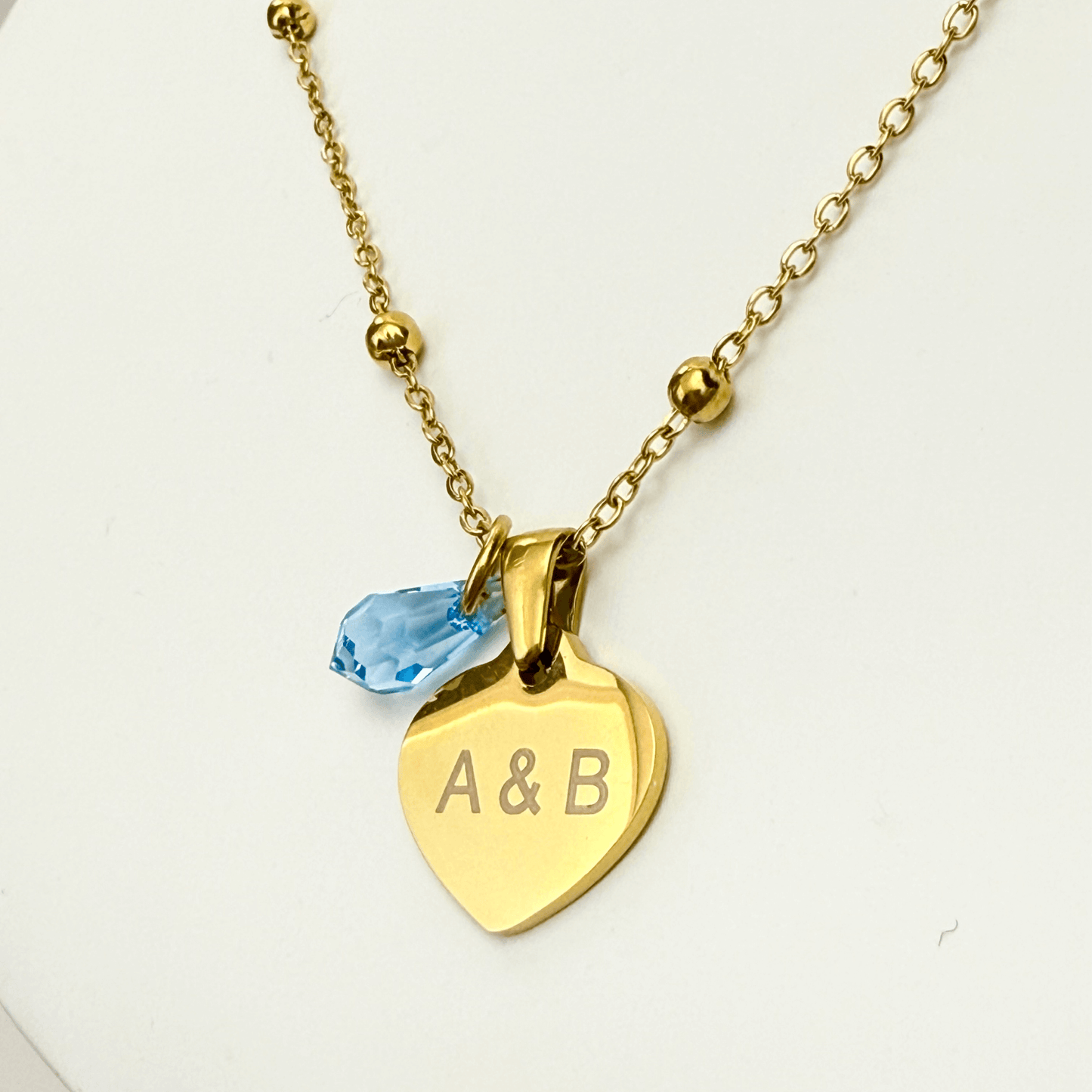 Custom engravable heart necklace with Swarovski birthstone, personalised jewellery, gold snake chain layering option.