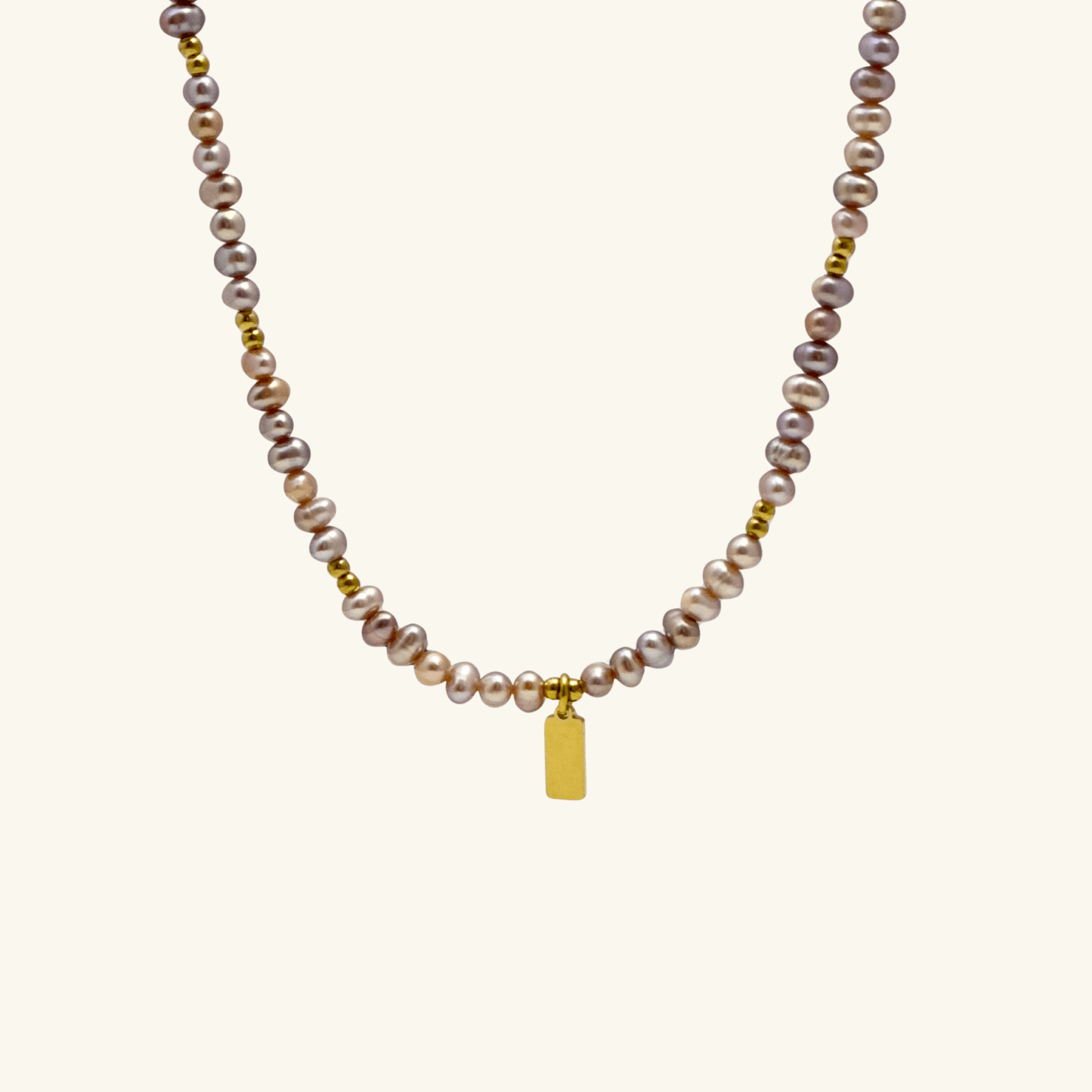 Custom purple pearl necklace with engravable charm in gold or silver – waterproof personalised jewellery.