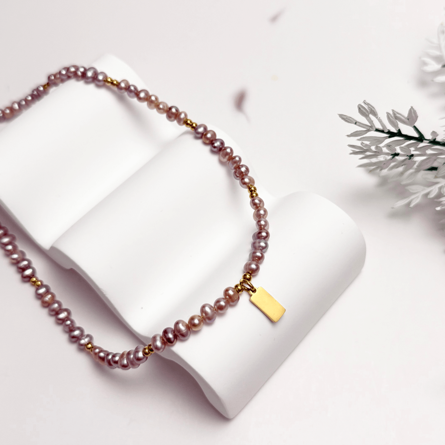 Custom purple pearl necklace with engravable charm in gold or silver – waterproof personalised jewellery.