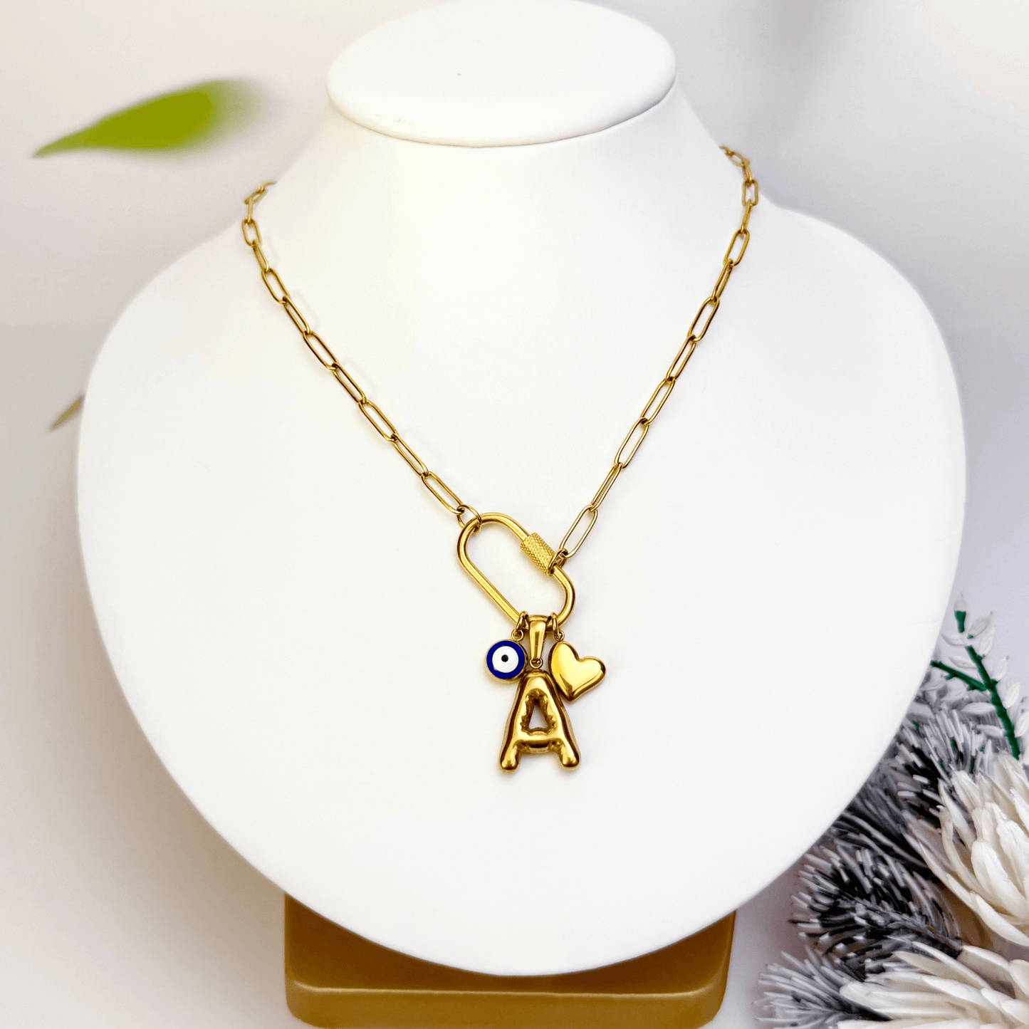 Custom rectangular ring necklace with detachable charms – initial, evil eye, and heart for love and protection.