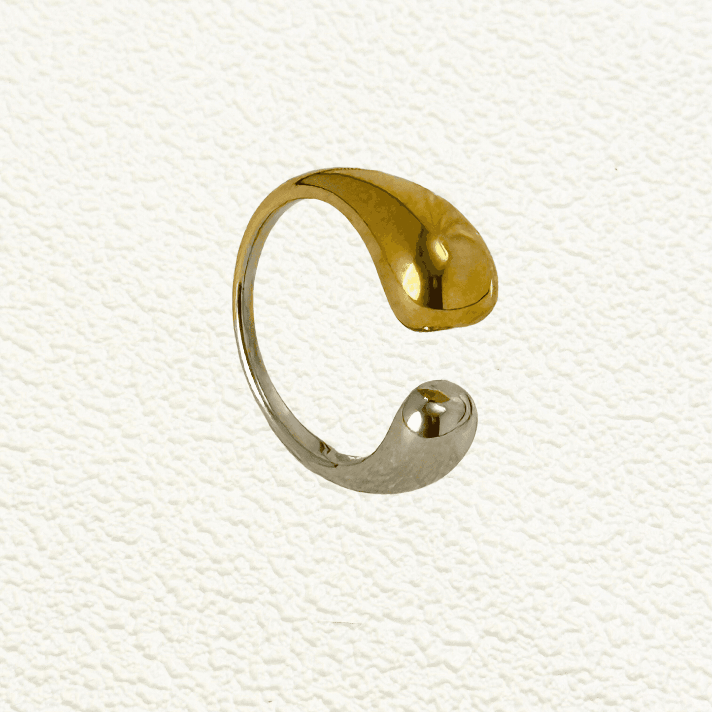 Dual tone gold and silver sculpted stainless steel ring for modern minimalist style