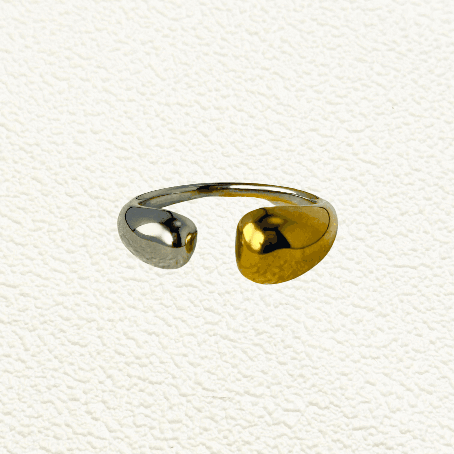 Dual tone gold and silver sculpted stainless steel ring for modern minimalist style