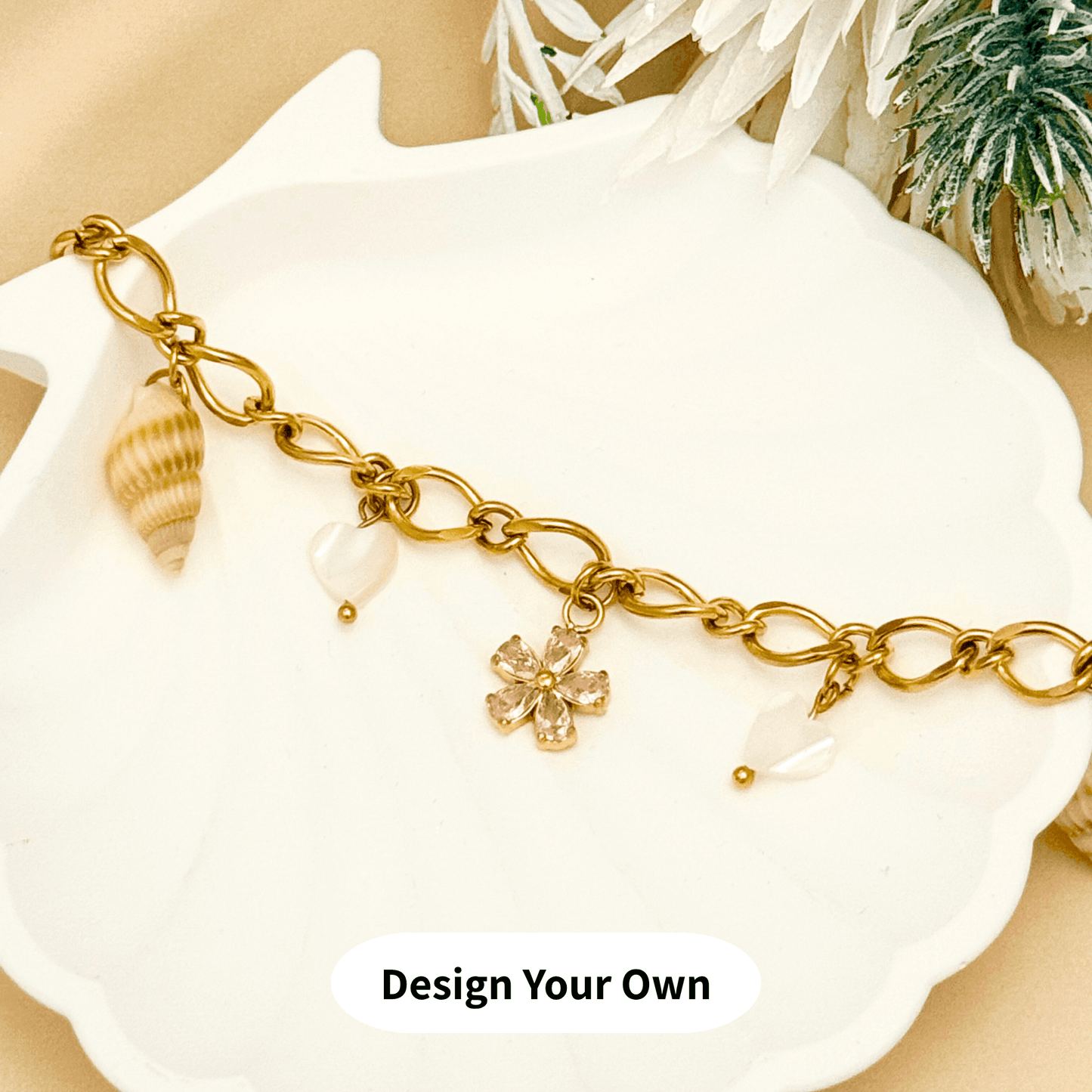 Design Your Own gold charm bracelet with extra-thick linked chain β customisable, waterproof, tarnish-free, and hypoallergenic. Create a meaningful bracelet with handpicked charms.