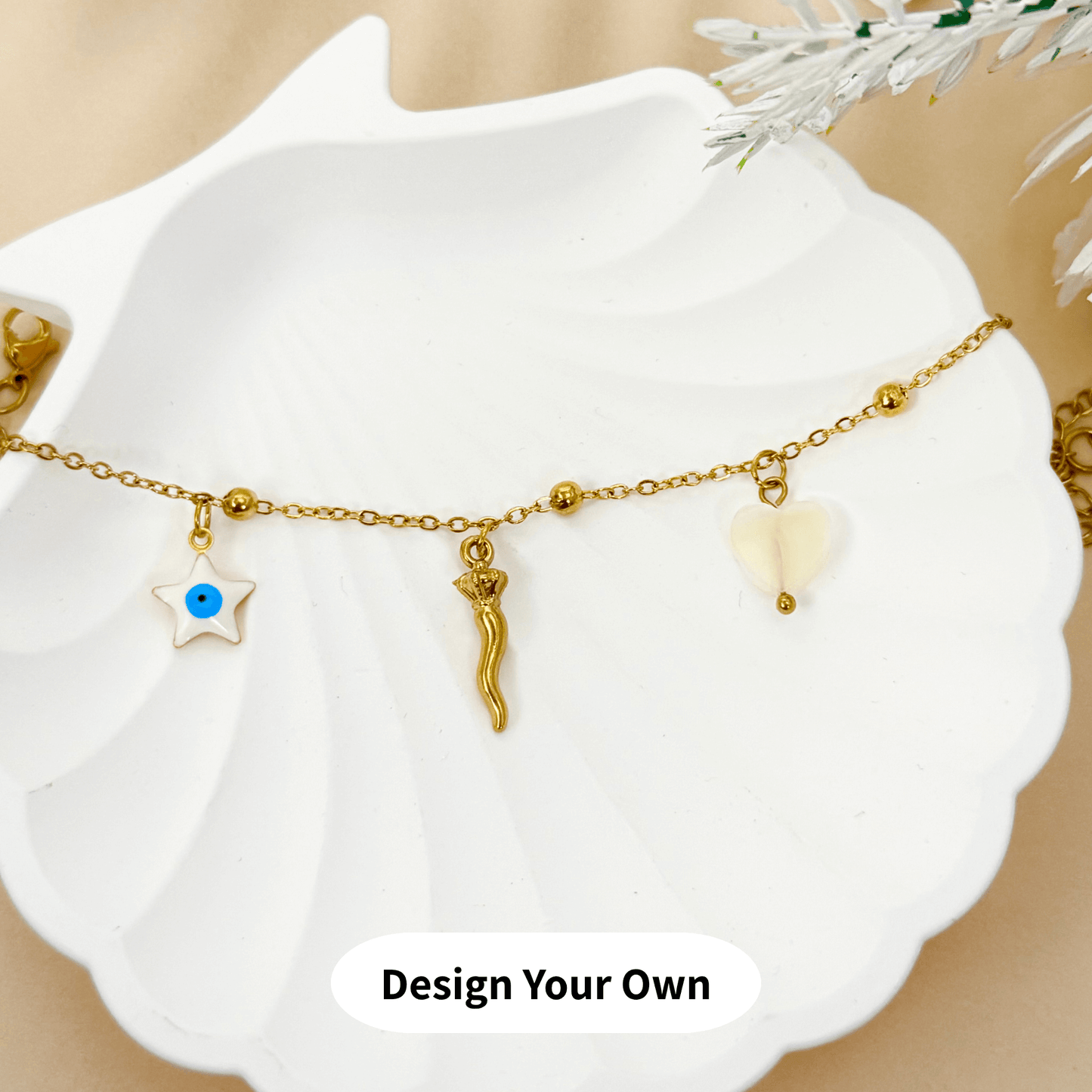 DYO (Design Your Own) gold charm bracelet featuring a delicate thin linked chain β minimalist and lightweight, perfect for layering or everyday wear. Waterproof, tarnish-free, and hypoallergenic.