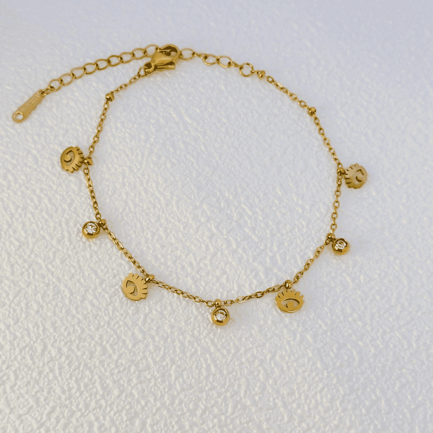 Dainty gold-plated evil eye bracelet with zircon accents, waterproof and hypoallergenic.