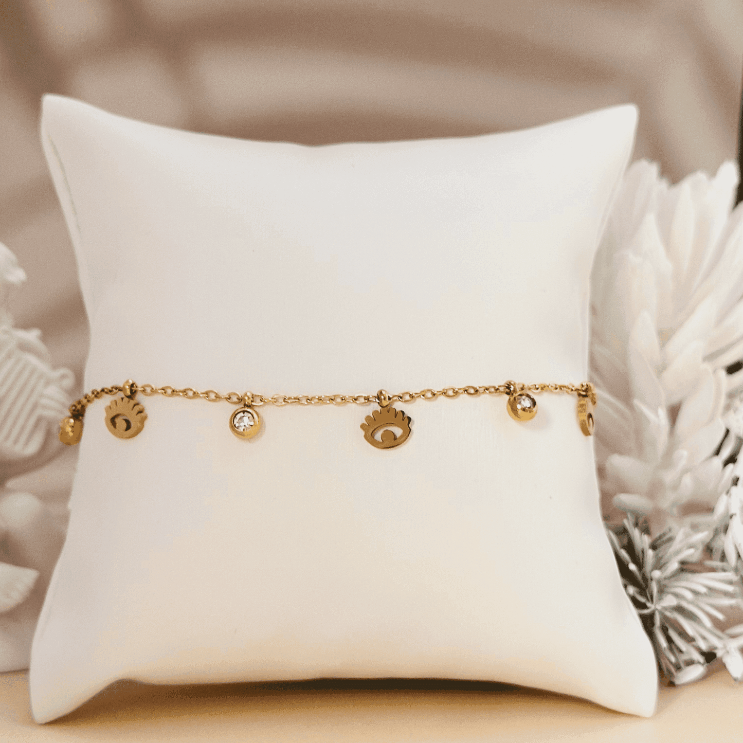 Dainty gold-plated evil eye necklace or bracelet with zircon accents, waterproof and hypoallergenic.