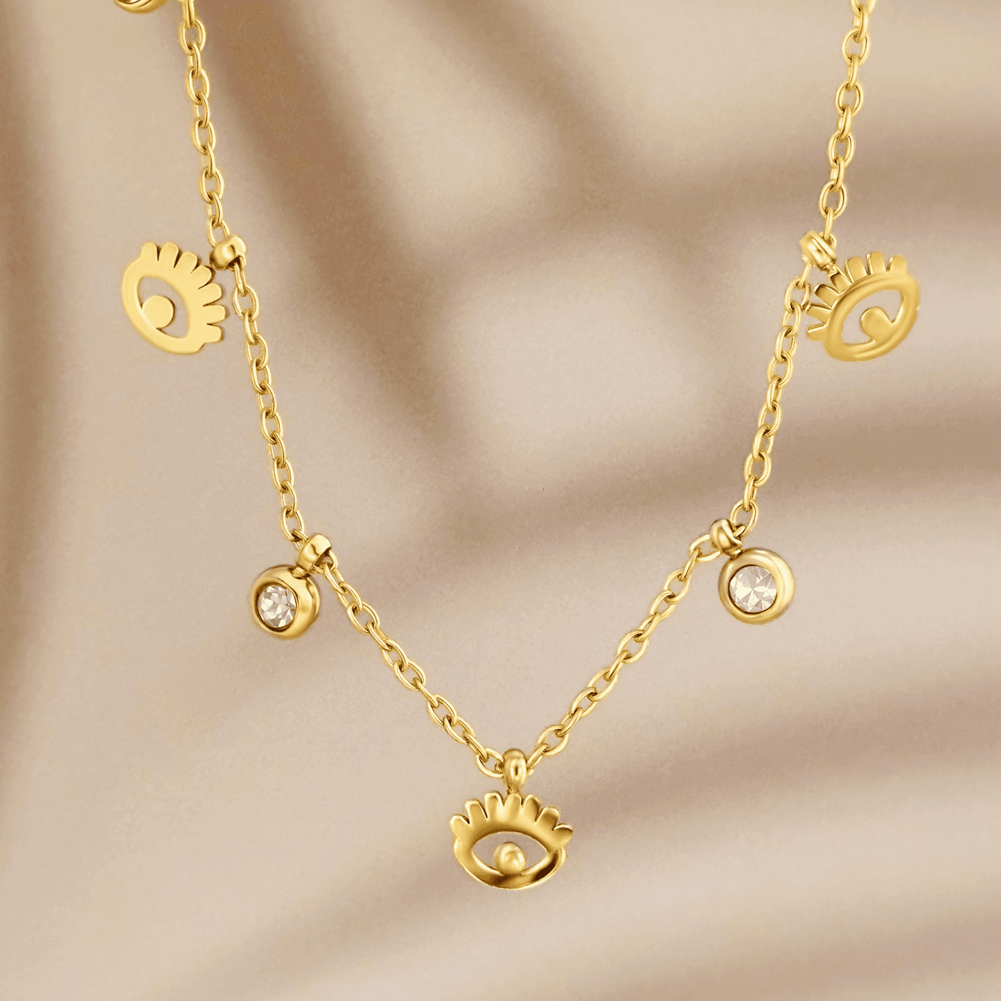 Dainty gold-plated evil eye necklace with zircon accents, waterproof and hypoallergenic.