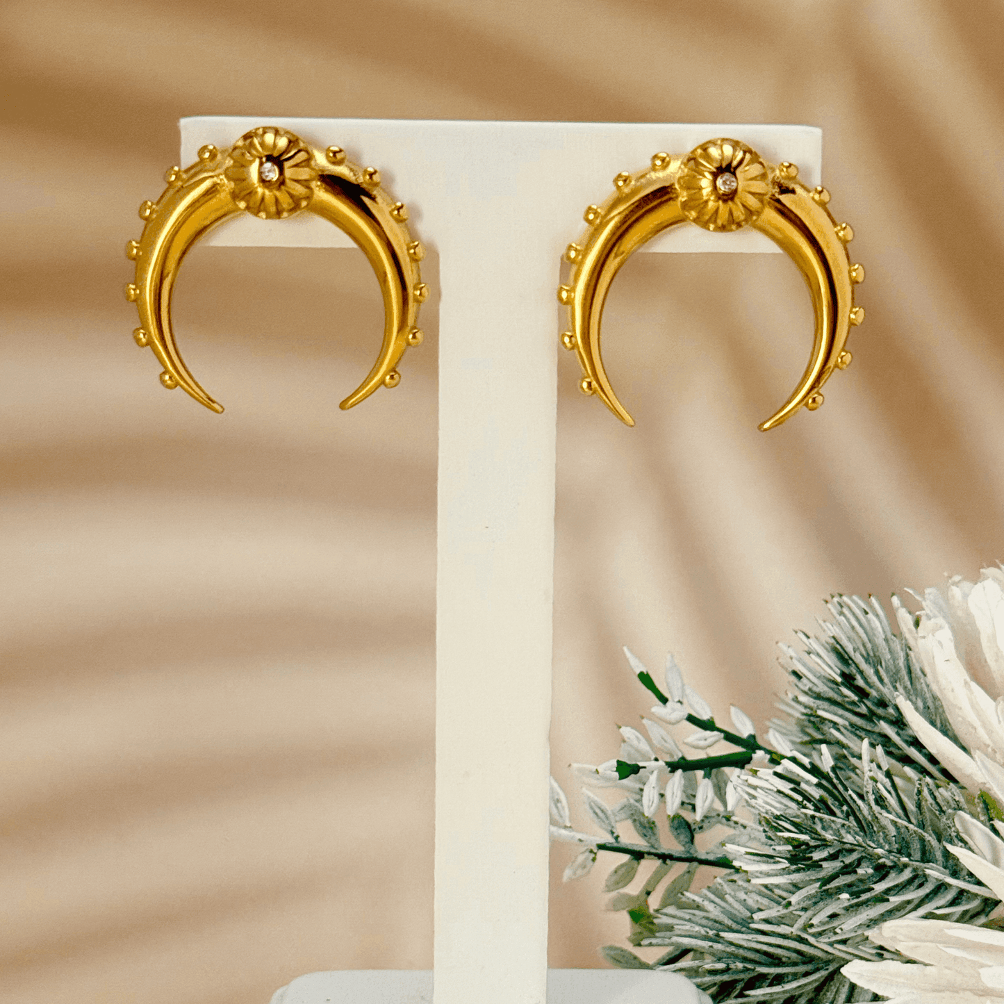 Celestine Gold Crescent Zircon Stud Earrings – crafted from stainless steel with a celestial crescent moon design and sparkling zircon stones. Durable, elegant, and timeless.