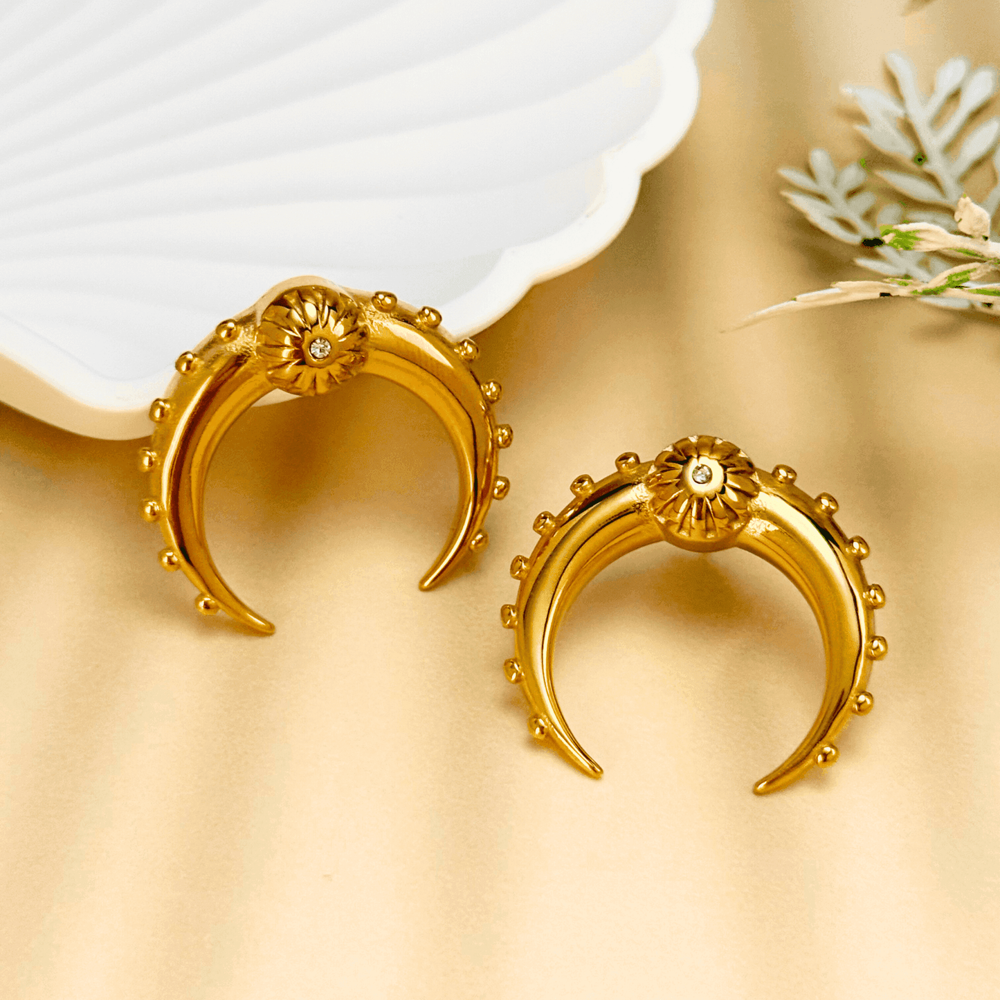 Celestine Gold Crescent Zircon Stud Earrings – crafted from stainless steel with a celestial crescent moon design and sparkling zircon stones. Durable, elegant, and timeless.