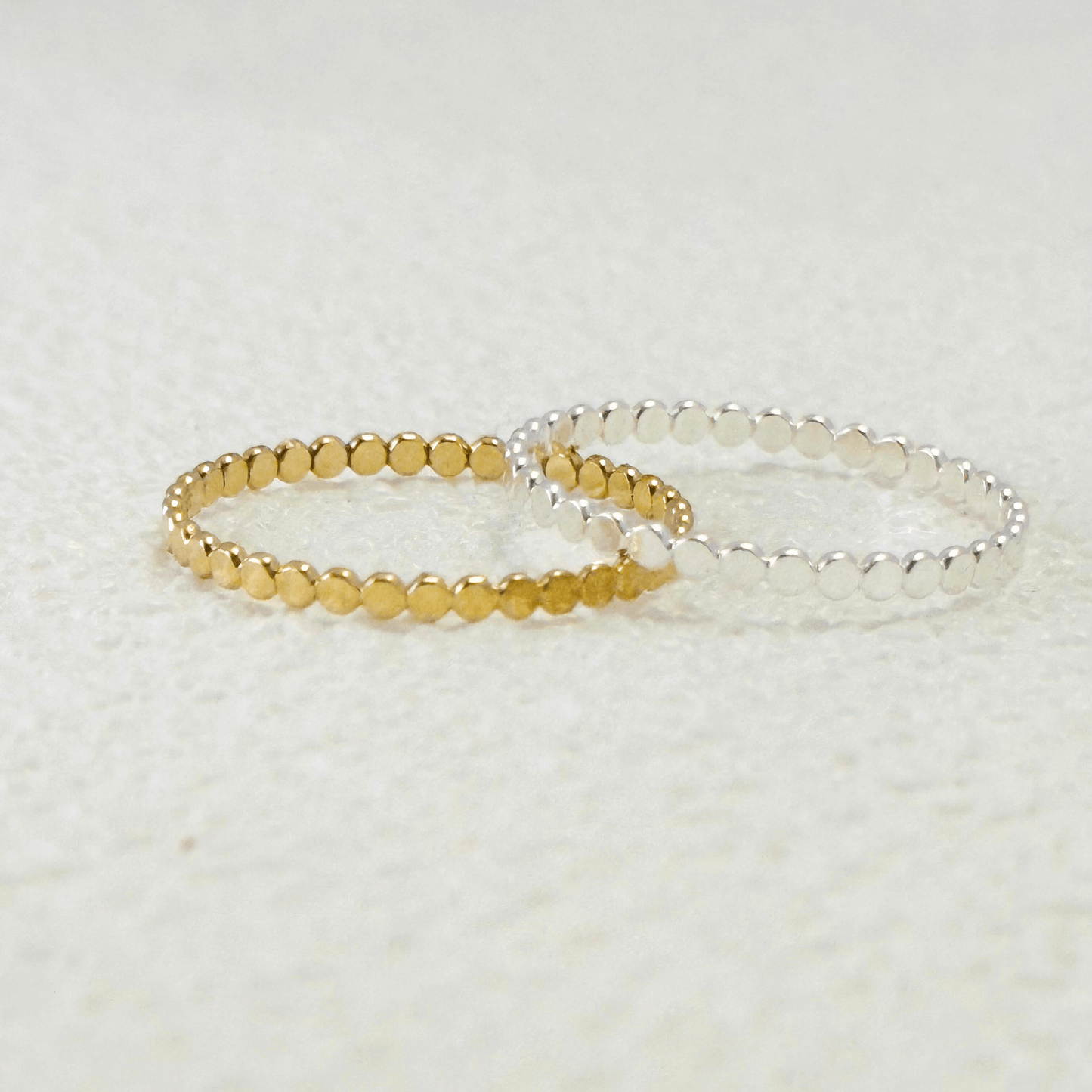 gold-filled flat disc stackable ring, minimalist jewellery with a sleek and elegant design.