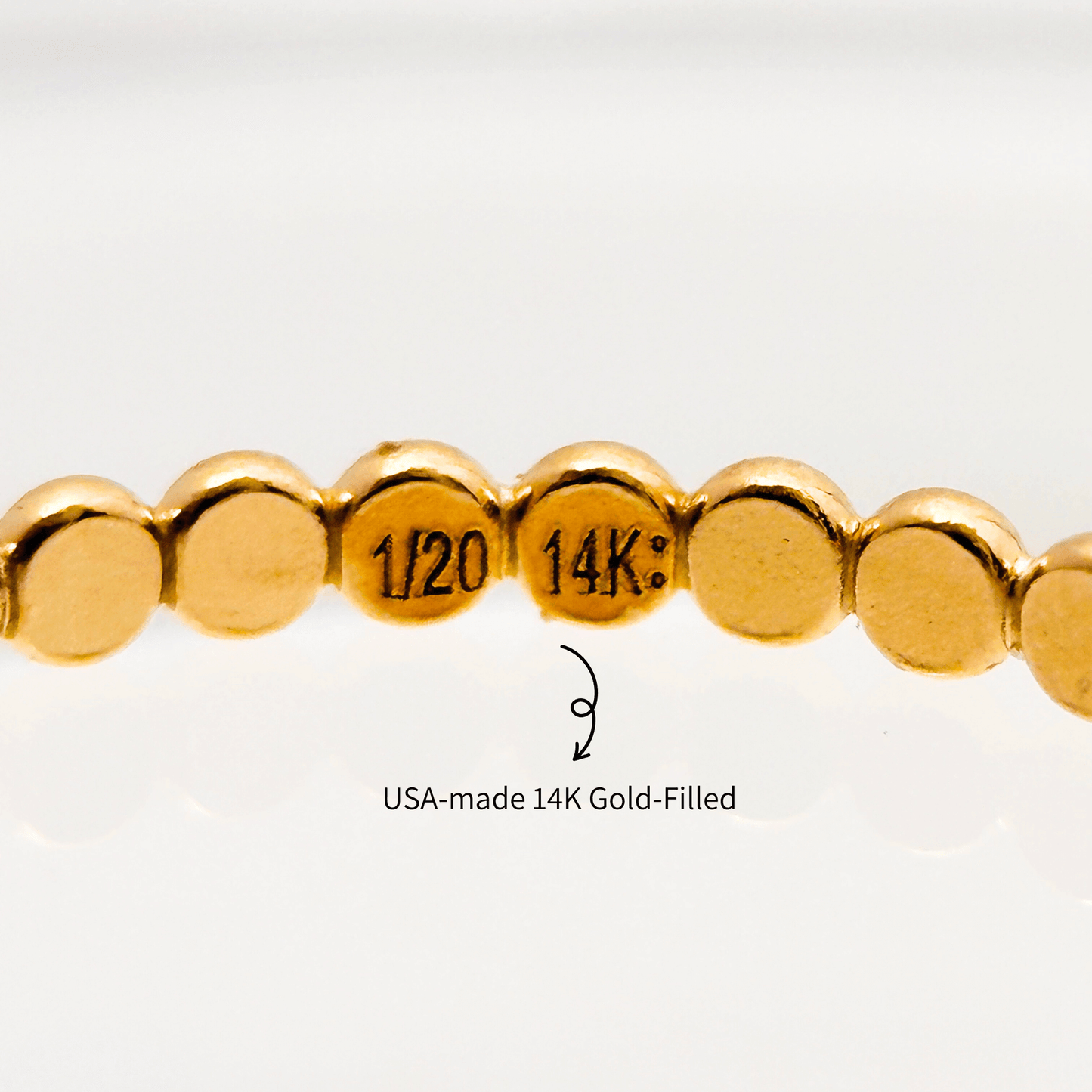 usa made 14k gold-filled flat disc stackable ring, minimalist jewellery with a sleek and elegant design.