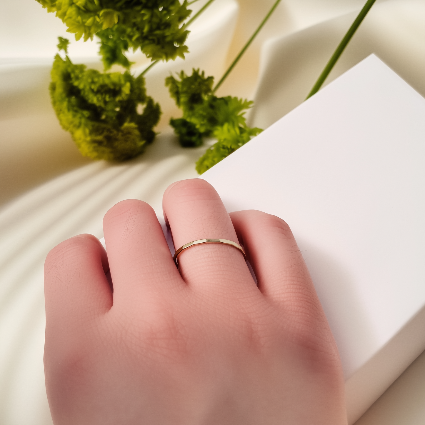 gold filled stackable ring with a textured hammered finish, minimalist and elegant design.