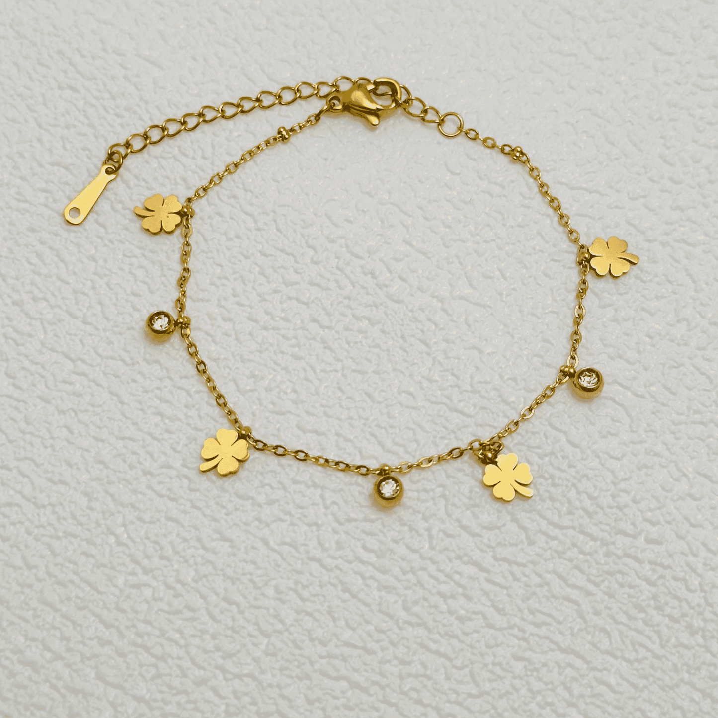 Gold four-leaf clover charm necklace or bracelet with zircon accents, waterproof and tarnish-resistant