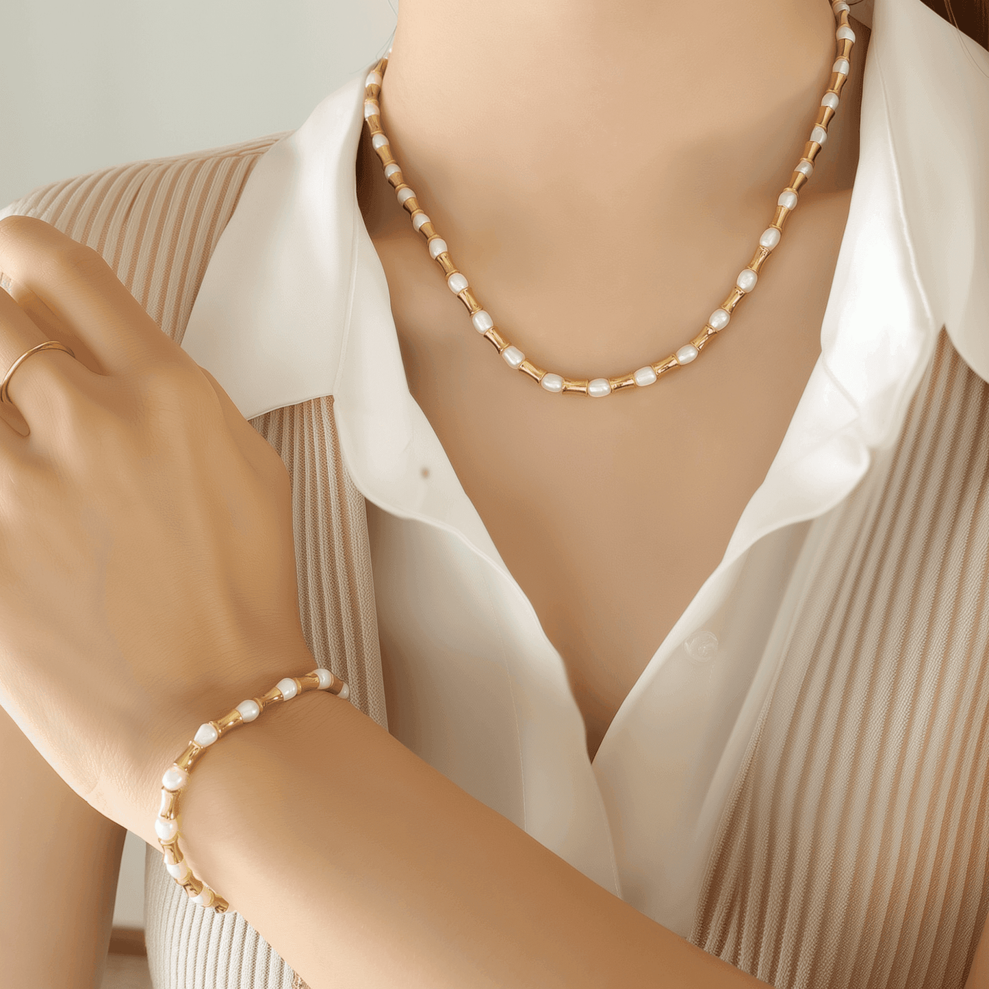 Gold and freshwater pearl choker necklace with tube beads, waterproof and minimalist design.