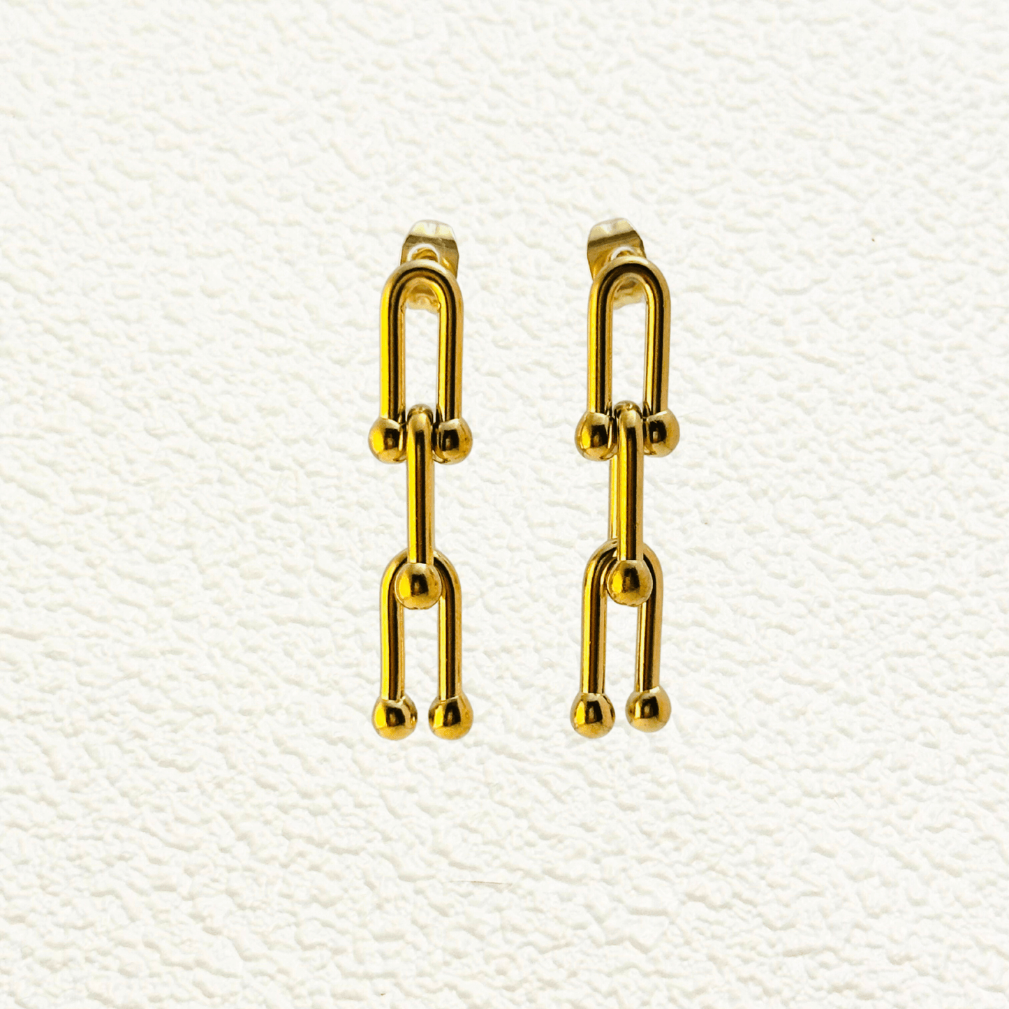 Nova Gold Geometric Drop Earrings - 18K gold-plated stainless steel with a bold, modern design.
