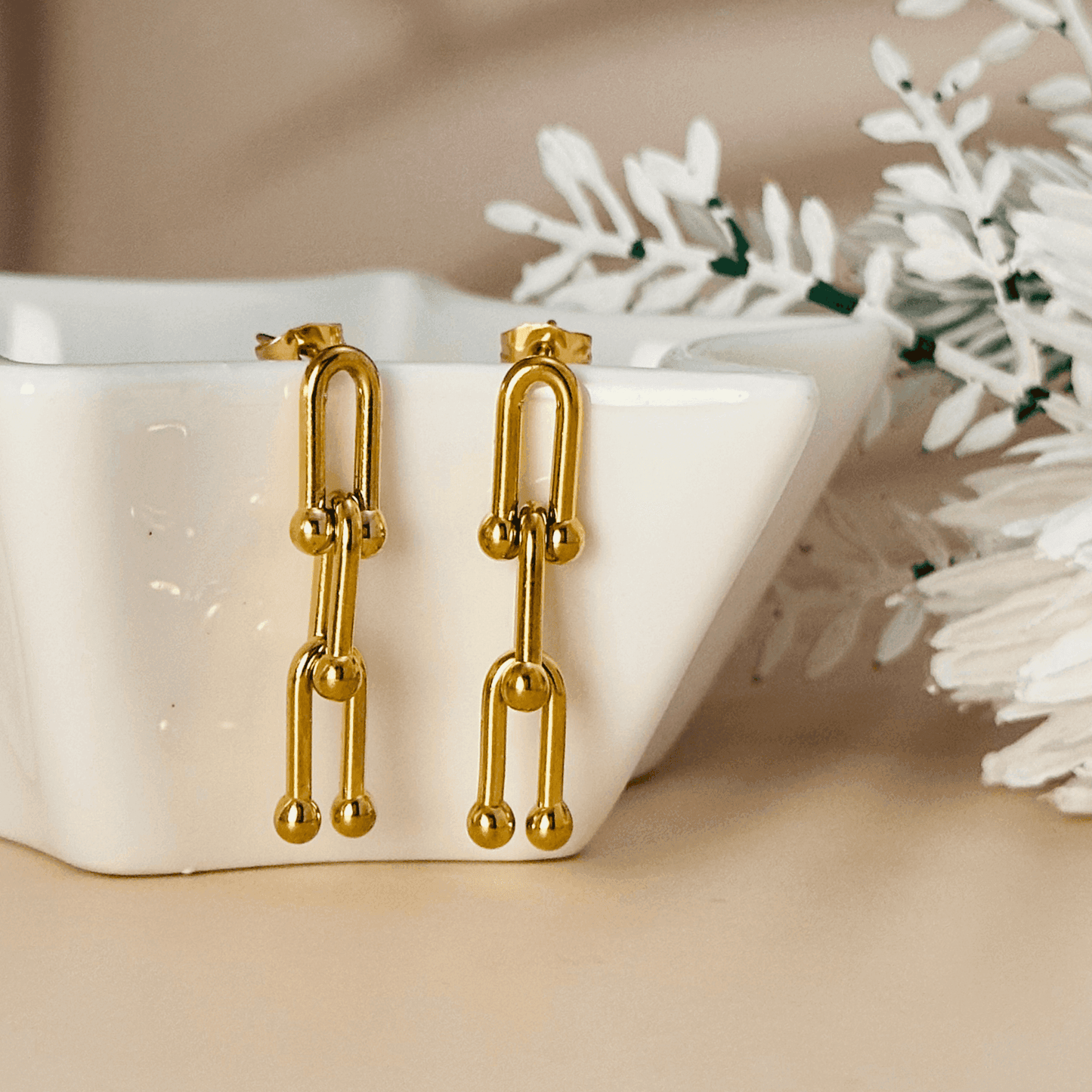 Nova Gold Geometric Drop Earrings - 18K gold-plated stainless steel with a bold, modern design.