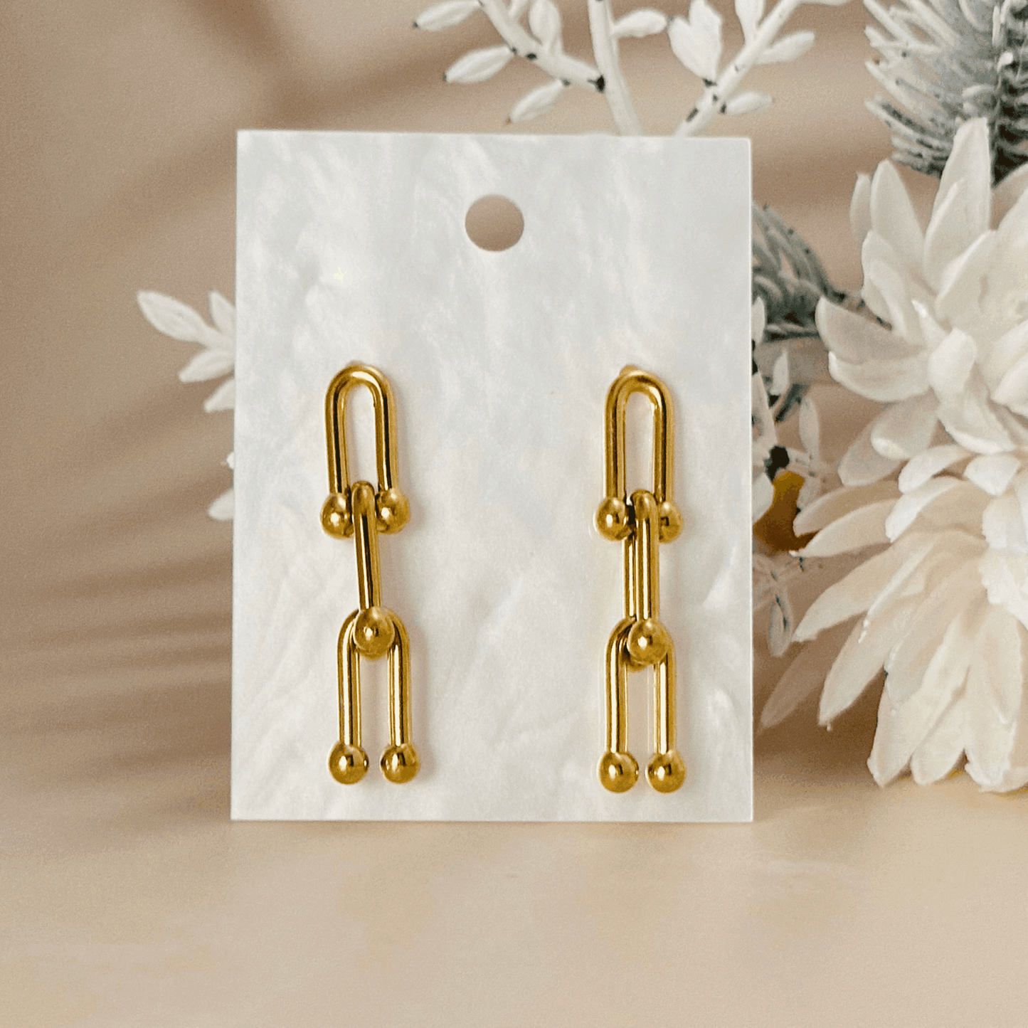 Nova Gold Geometric Drop Earrings - 18K gold-plated stainless steel with a bold, modern design.