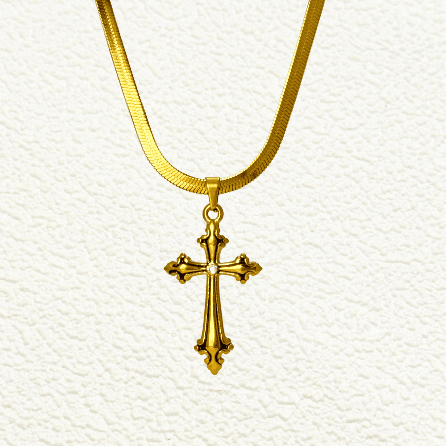 Gold ornate cross pendant necklace with zircon stone, baroque-inspired design, modern religious jewellery for spiritual gifting or everyday faith-based fashion.