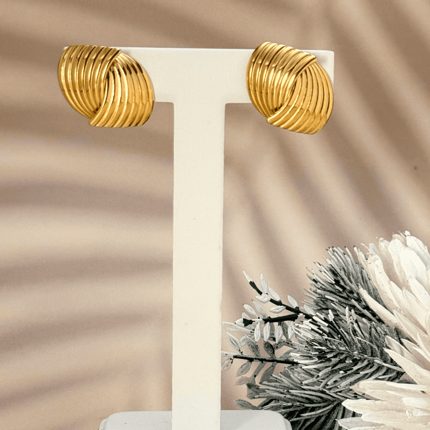 gold pleated shell earrings with curved sculptural design, PVD gold plated stainless steel studs, bold vintage-inspired jewellery by MXW