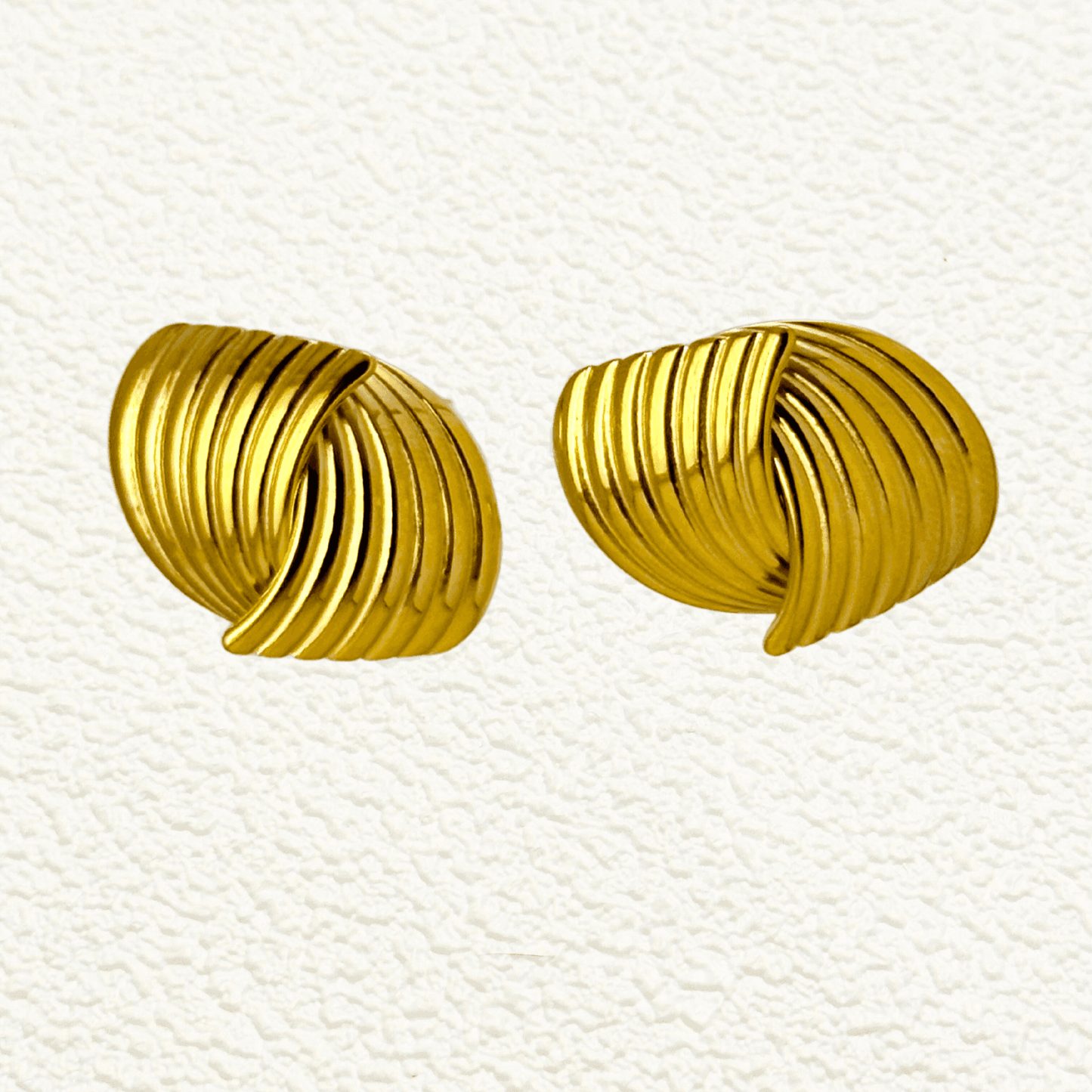 gold pleated shell earrings with curved sculptural design, PVD gold plated stainless steel studs, bold vintage-inspired jewellery by MXW