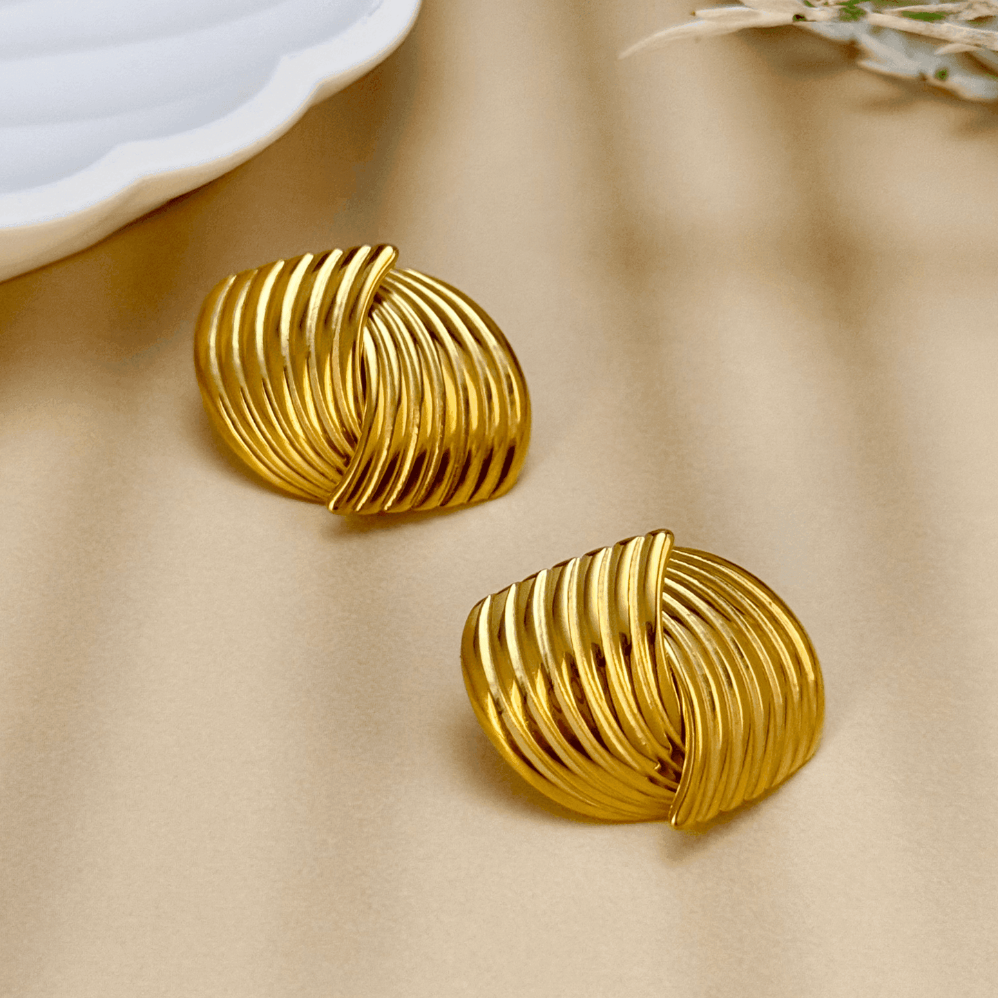 gold pleated shell earrings with curved sculptural design, PVD gold plated stainless steel studs, bold vintage-inspired jewellery by MXW