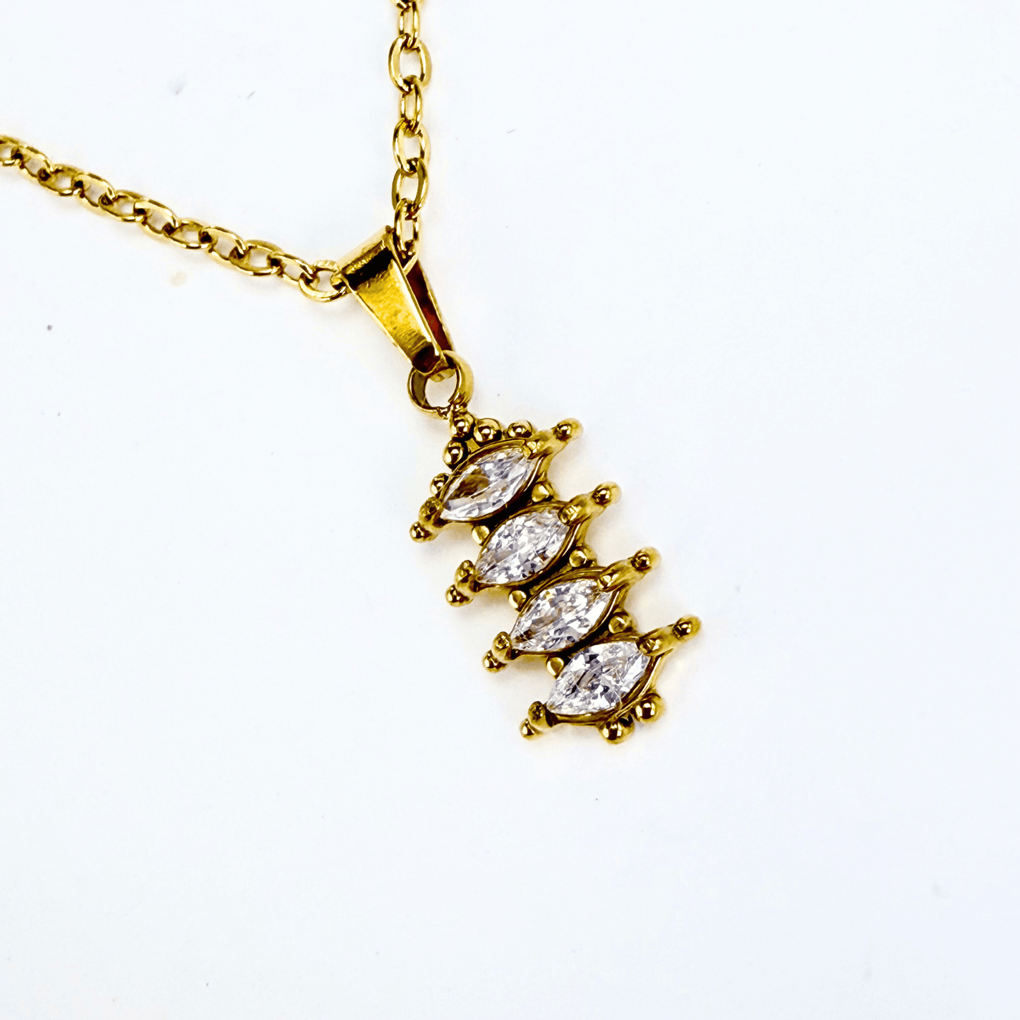 gold quad marquise crystal necklace with four clear navette stones on fine gold chain