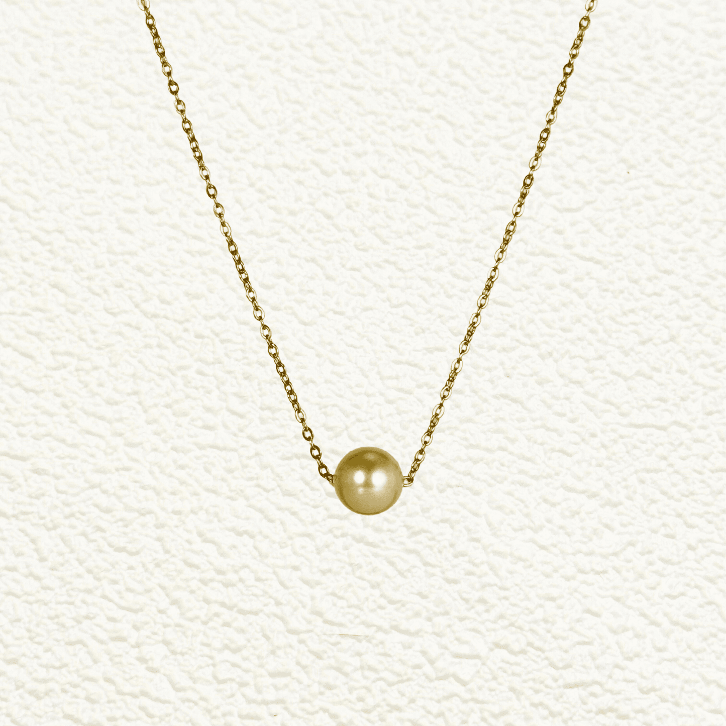 Minimalist Swarovski crystal pearl necklace with single pearl on gold and silver stainless steel chains, elegant everyday jewellery