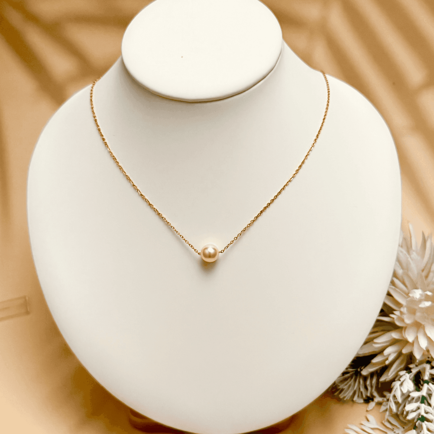 Minimalist Swarovski crystal pearl necklace with single pearl on gold and silver stainless steel chains, elegant everyday jewellery