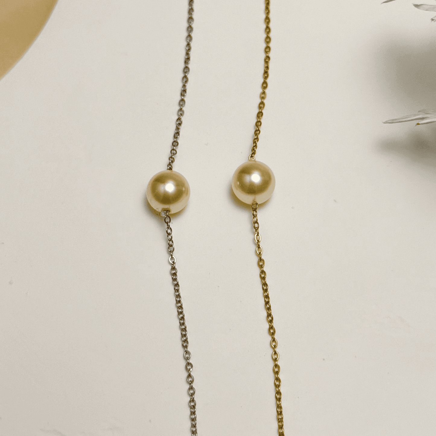Minimalist Swarovski crystal pearl necklace with single pearl on gold and silver stainless steel chains, elegant everyday jewellery
