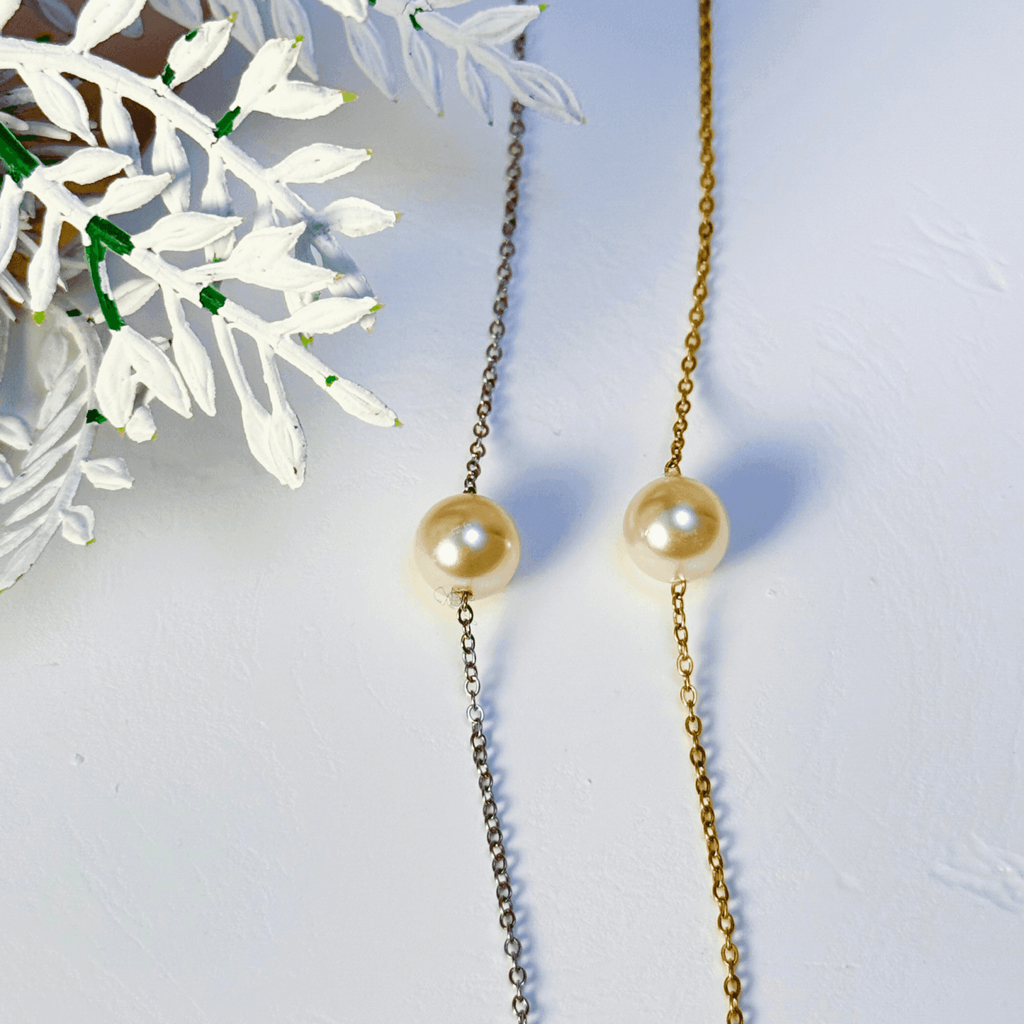 Minimalist Swarovski crystal pearl necklace with single pearl on gold and silver stainless steel chains, elegant everyday jewellery