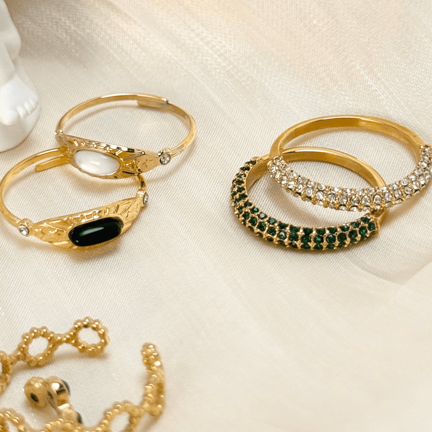Gold stacking adjustable rings featuring natural stones and intricate boho designs. Waterproof and stylish, perfect for layering and everyday wear.