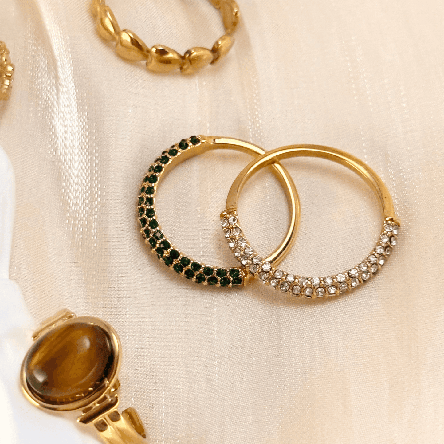 Gold stacking adjustable rings featuring natural stones and intricate boho designs. Waterproof and stylish, perfect for layering and everyday wear.