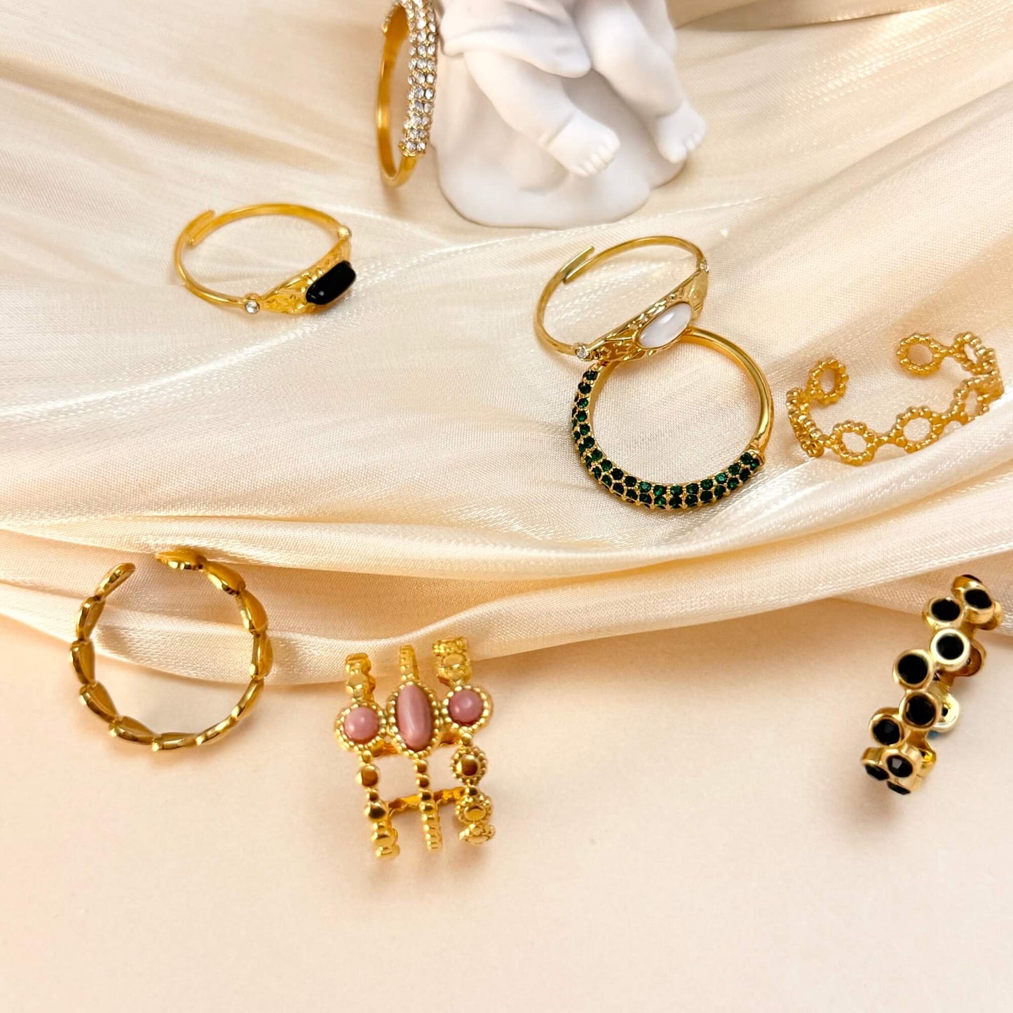 Gold stacking adjustable rings featuring natural stones and intricate boho designs. Waterproof and stylish, perfect for layering and everyday wear.