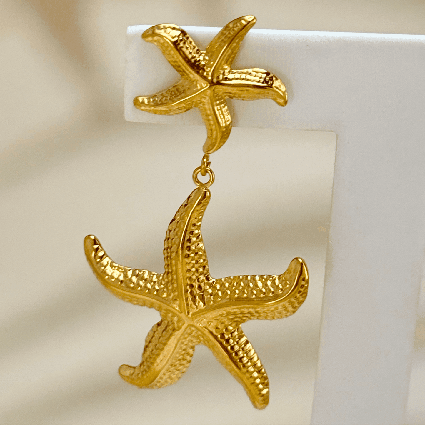 Gold starfish drop earrings, ocean-inspired waterproof statement jewellery