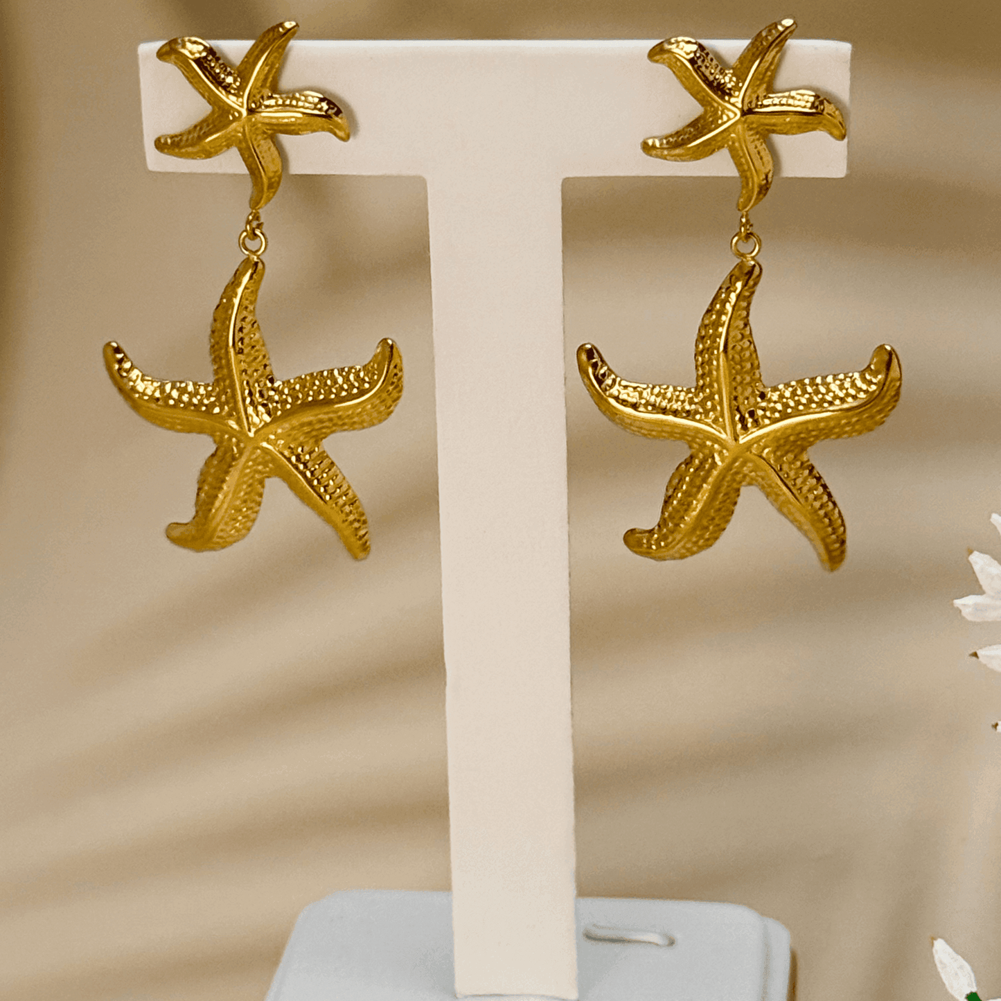Gold starfish drop earrings, ocean-inspired waterproof statement jewellery