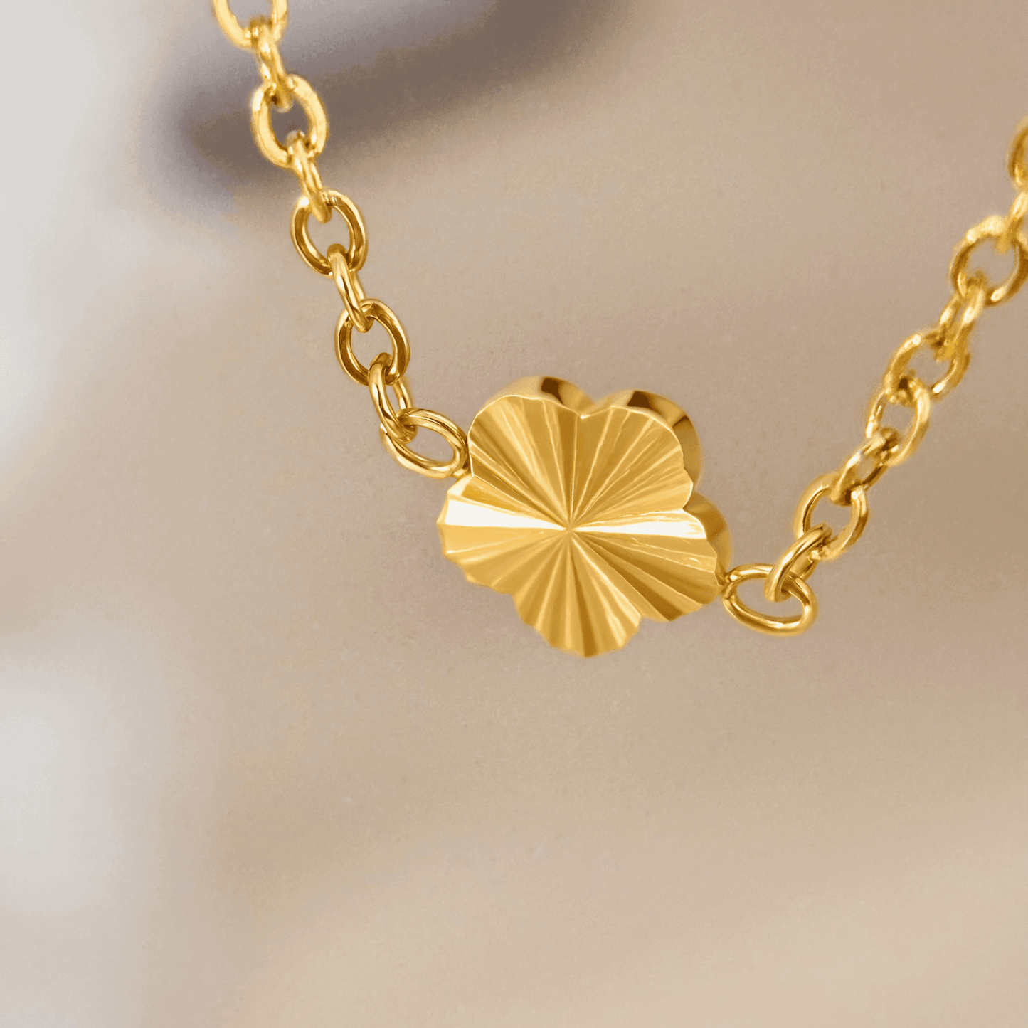 Gold Sunburst Charm Necklace with dainty chain and radiant details
