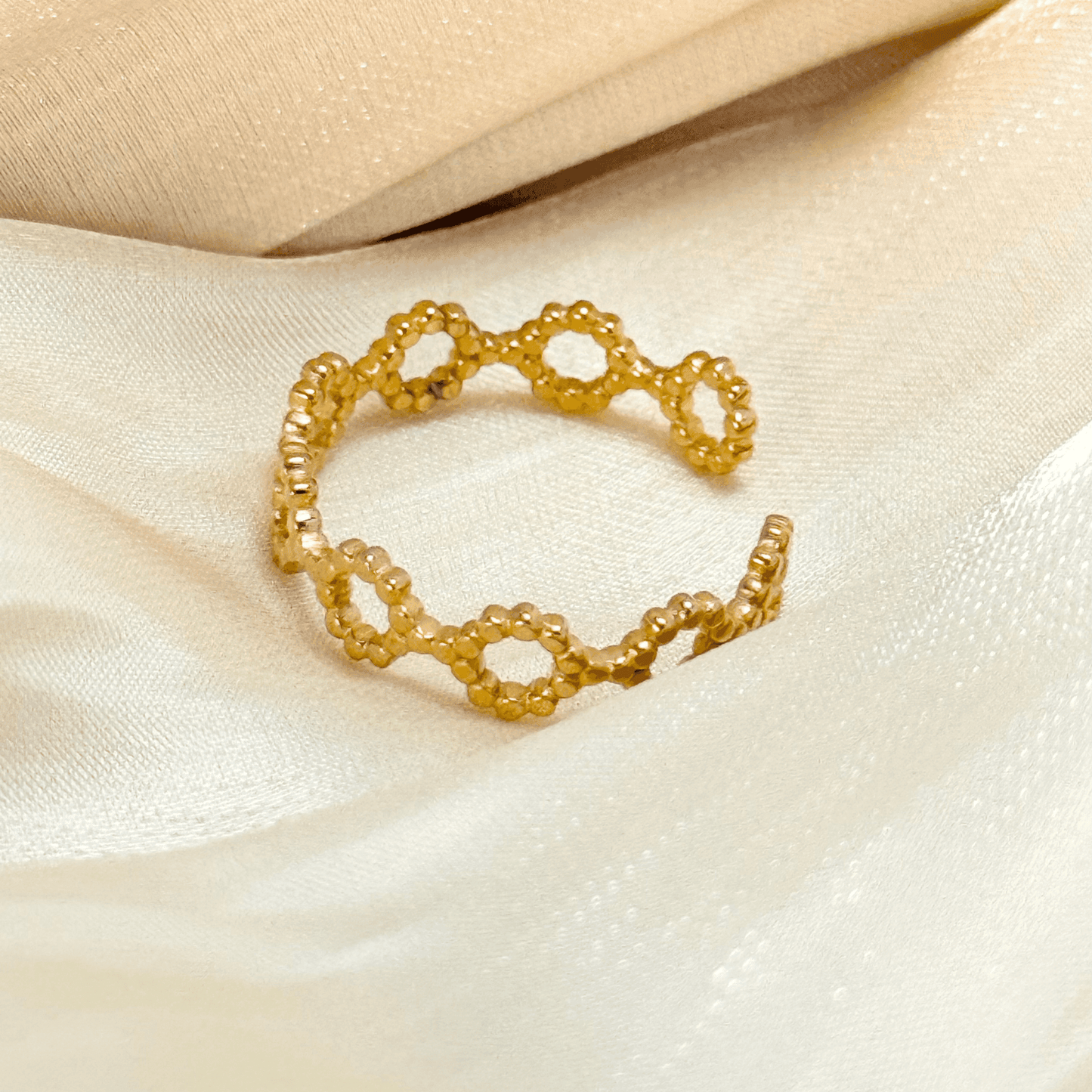 gold textured geometric open ring with hexagonal cutout design, adjustable and waterproof for everyday wear.