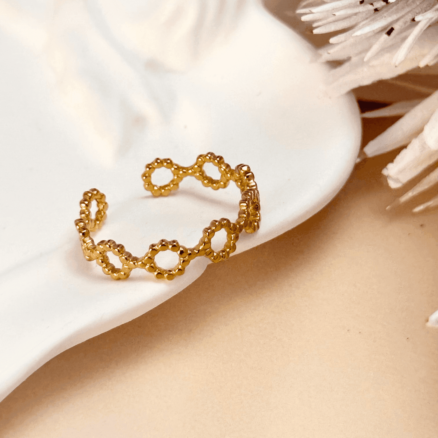 gold textured geometric open ring with hexagonal cutout design, adjustable and waterproof for everyday wear.