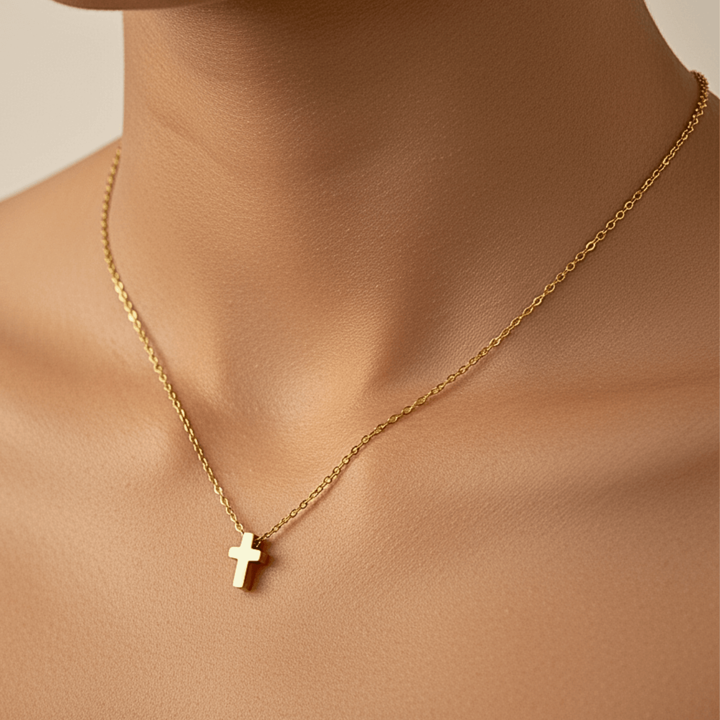 Gold tiny cross necklace symbolising faith and grace – MXW Jewellery