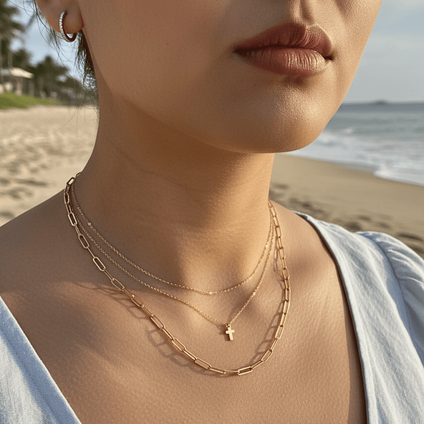 Gold tiny cross necklace symbolising faith and grace – MXW Jewellery