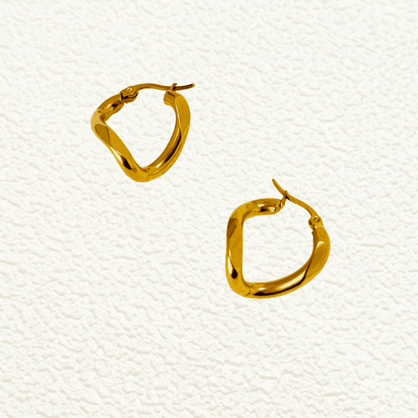 Gold Twisted Round Hoop Earrings with a modern twisted round shape, crafted in PVD gold-plated stainless steel, waterproof