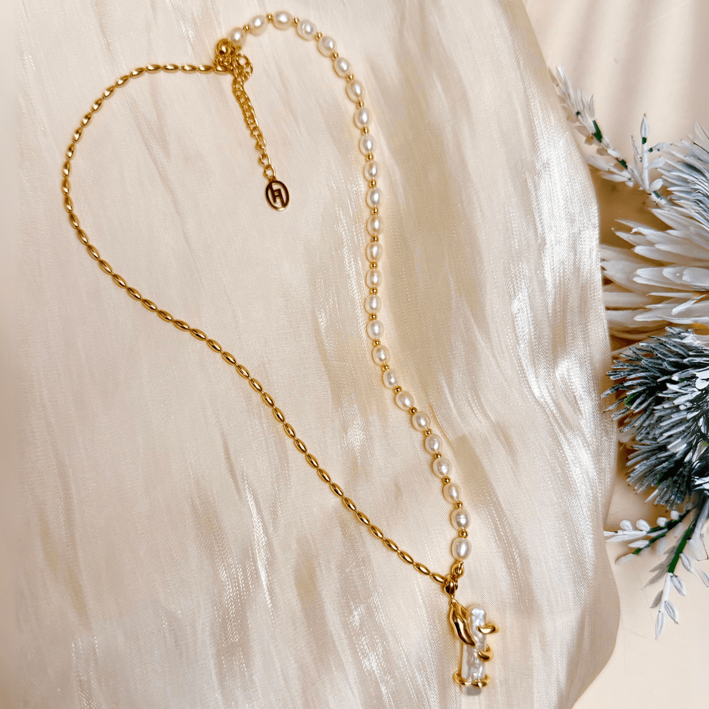 necklace with gold vine-wrapped pearl pendant on half pearl, half gold beaded chain