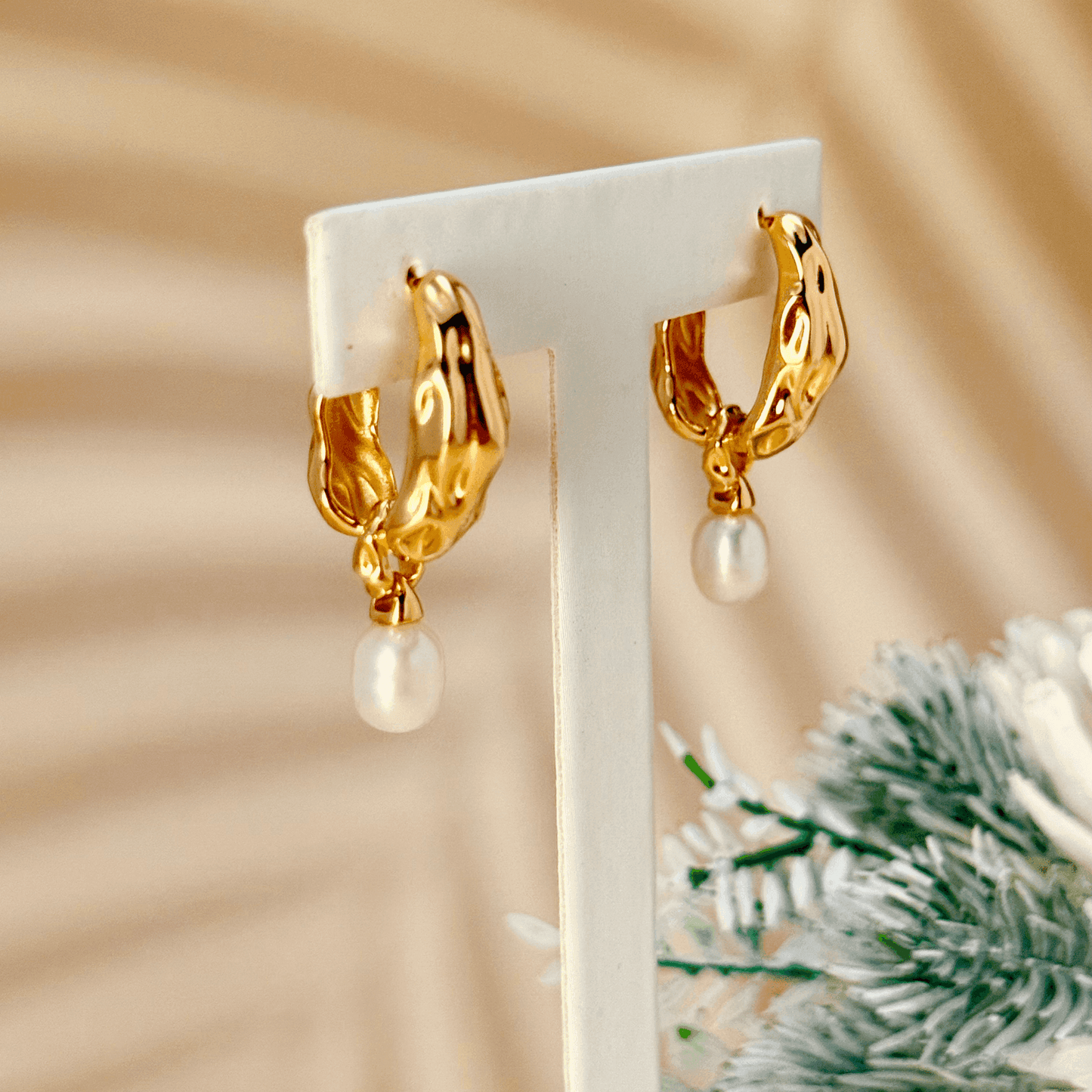 Elegant gold-plated freshwater pearl drop earrings with vintage molten texture, crafted in 925 sterling silver for a timeless, sophisticated look.